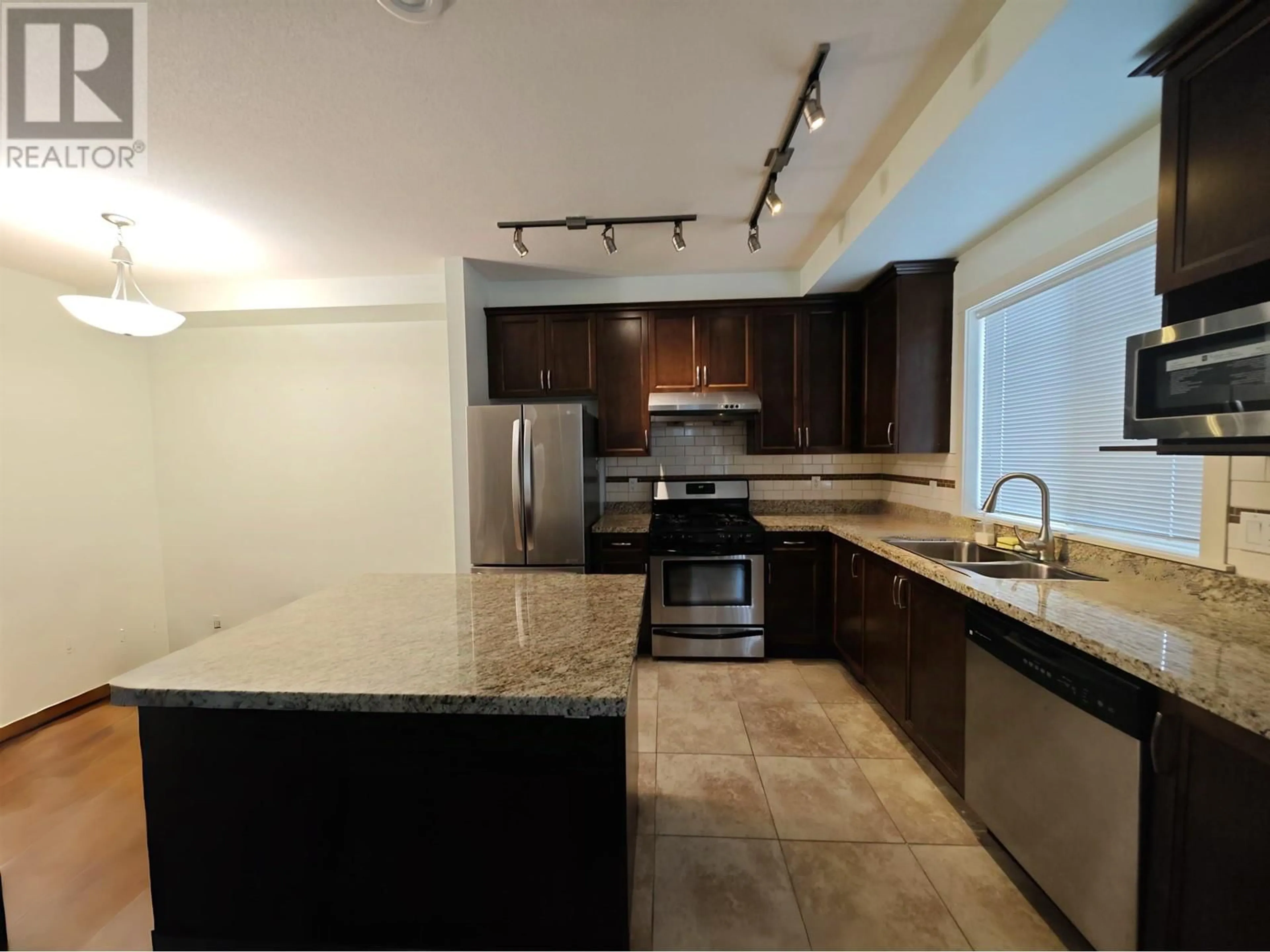 Open concept kitchen, ceramic/tile floor for 34 - 11393 STEVESTON HIGHWAY, Richmond British Columbia V7A1N8