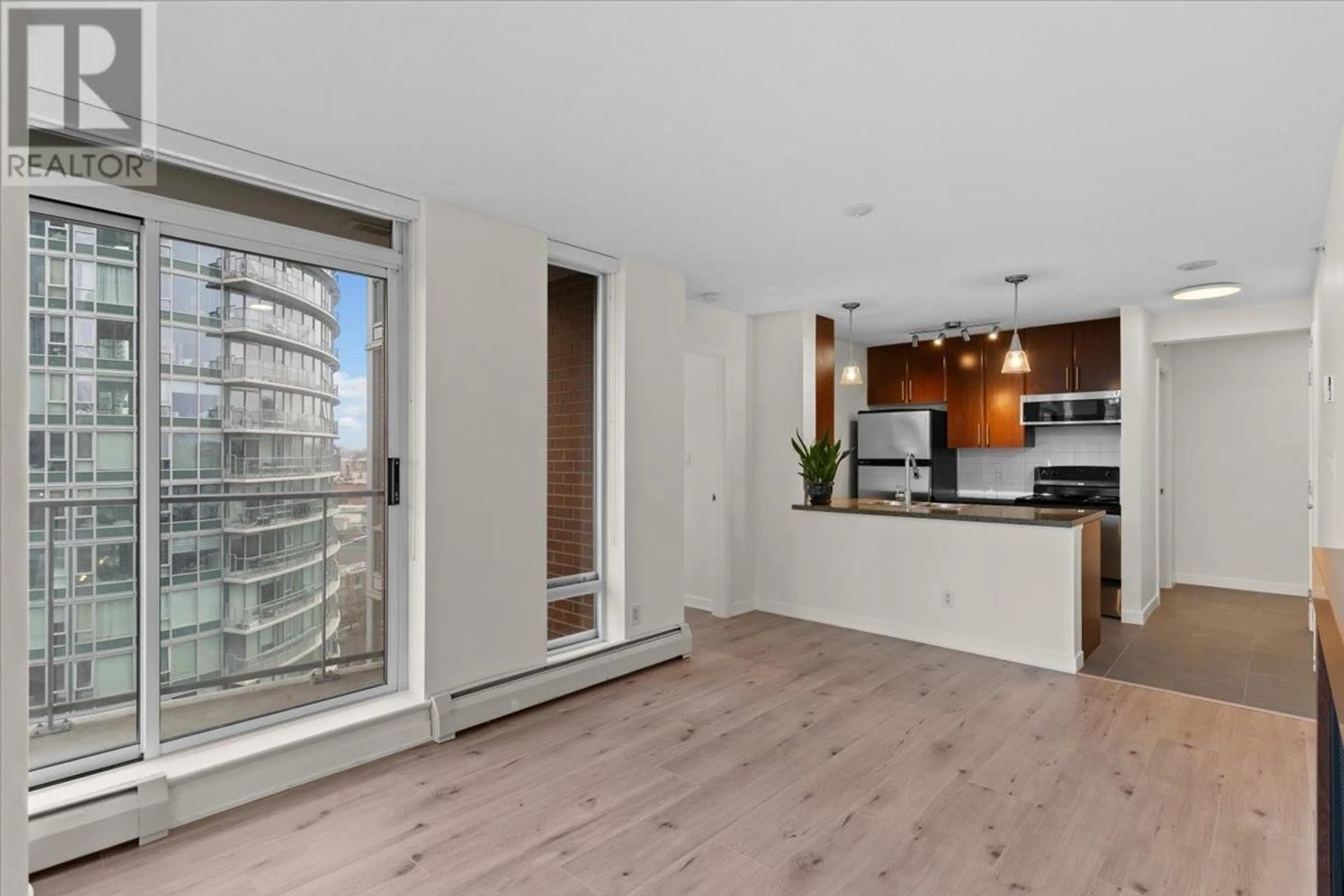Open concept kitchen, wood/laminate floor for 1508 - 688 ABBOTT STREET, Vancouver British Columbia V6B0B9