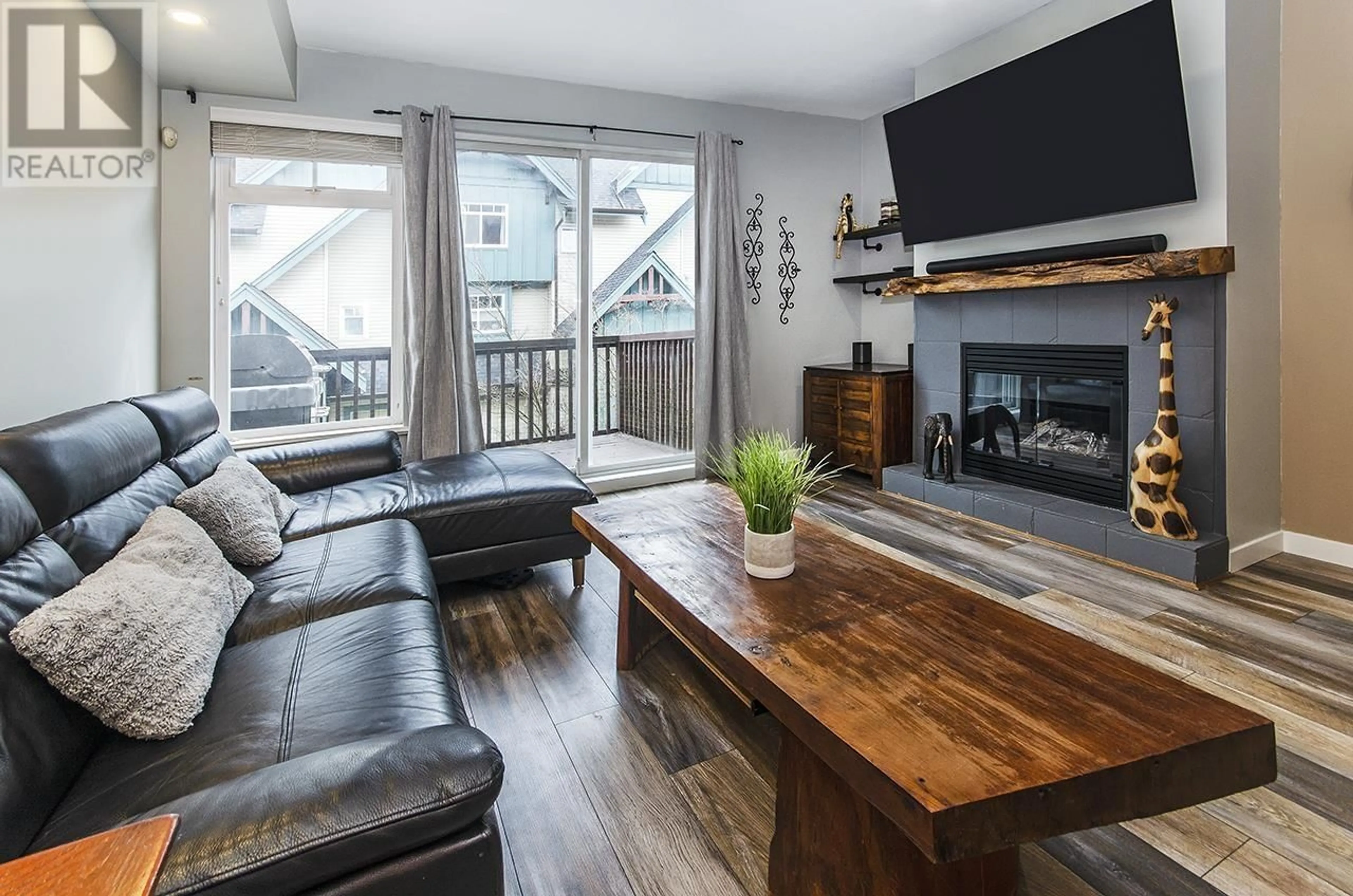 Living room with furniture, wood/laminate floor for 36 - 50 PANORAMA PLACE, Port Moody British Columbia V3H5H5