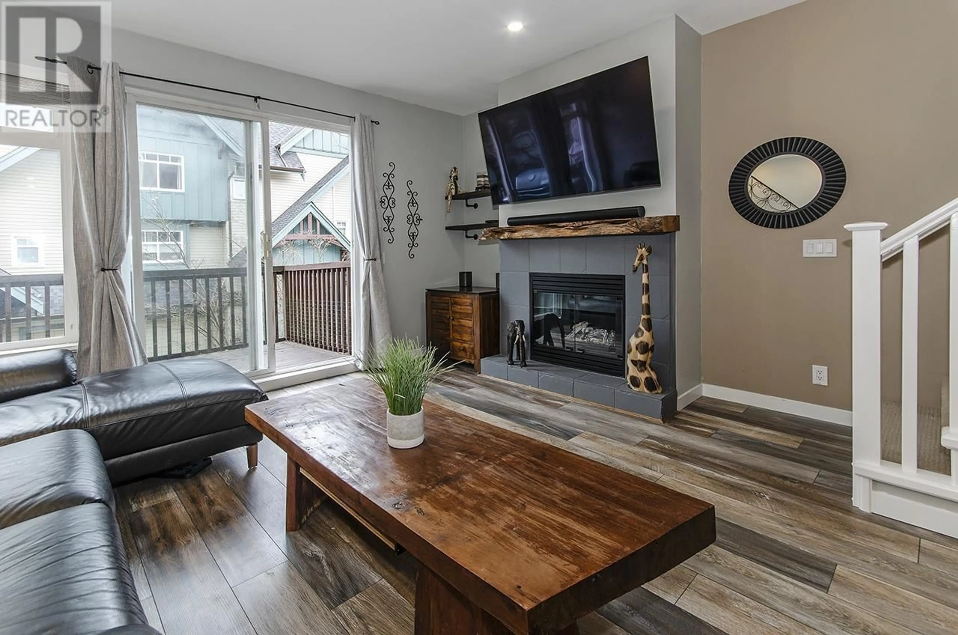 Living room with furniture, wood/laminate floor for 36 - 50 PANORAMA PLACE, Port Moody British Columbia V3H5H5