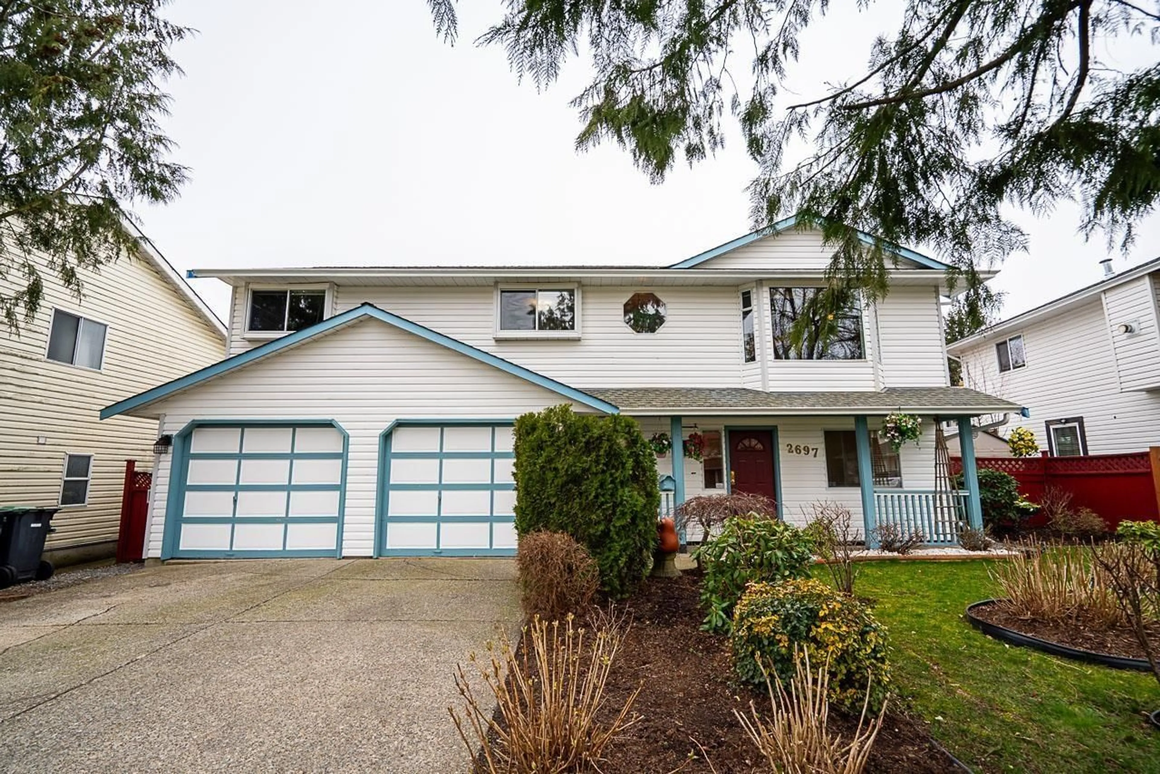 Home with vinyl exterior material, street for 2697 273A, Langley British Columbia V4W3K3