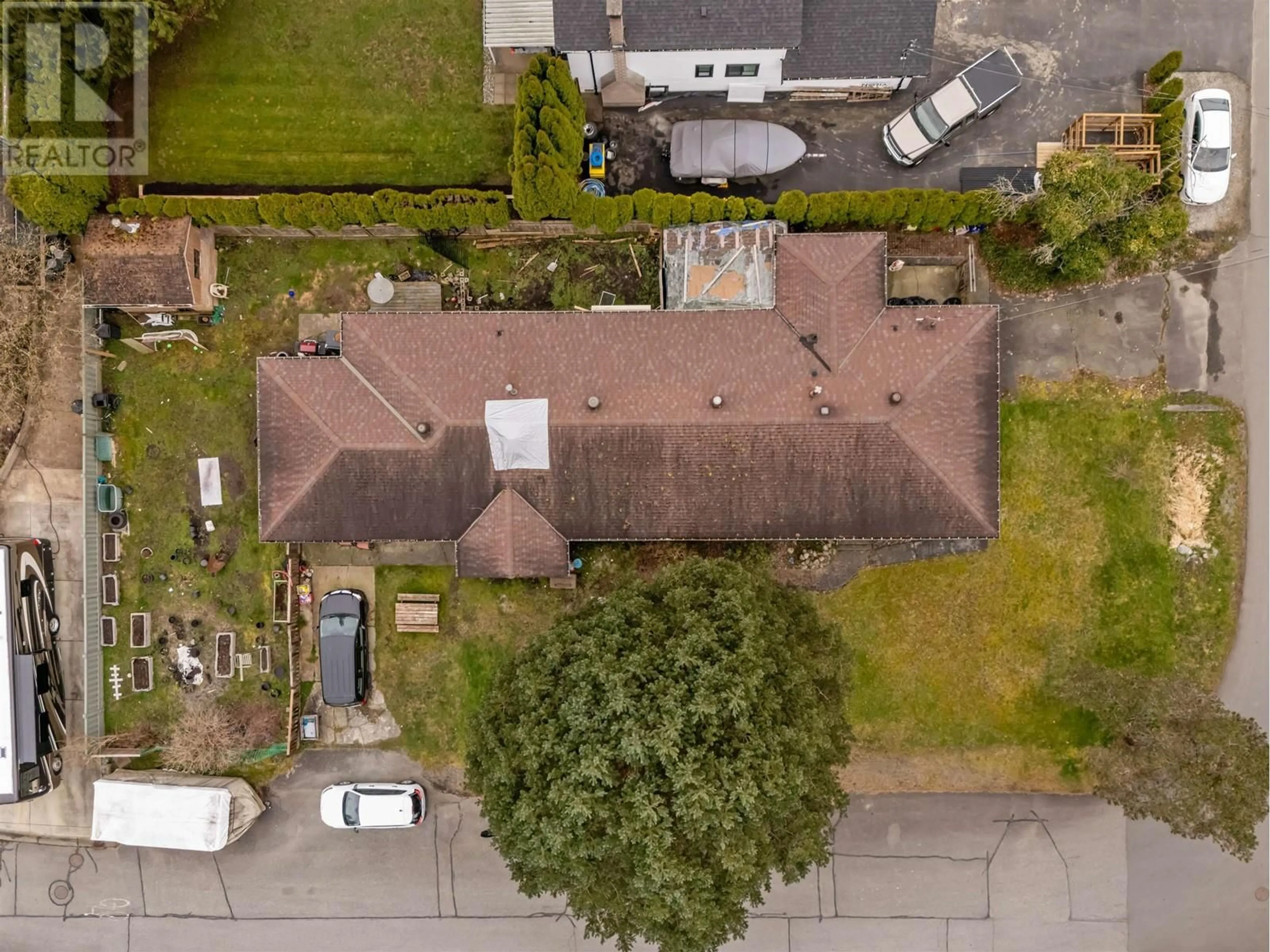 A pic from outside/outdoor area/front of a property/back of a property/a pic from drone, street for 1 - 23338 122 AVENUE, Maple Ridge British Columbia V2X3Y7