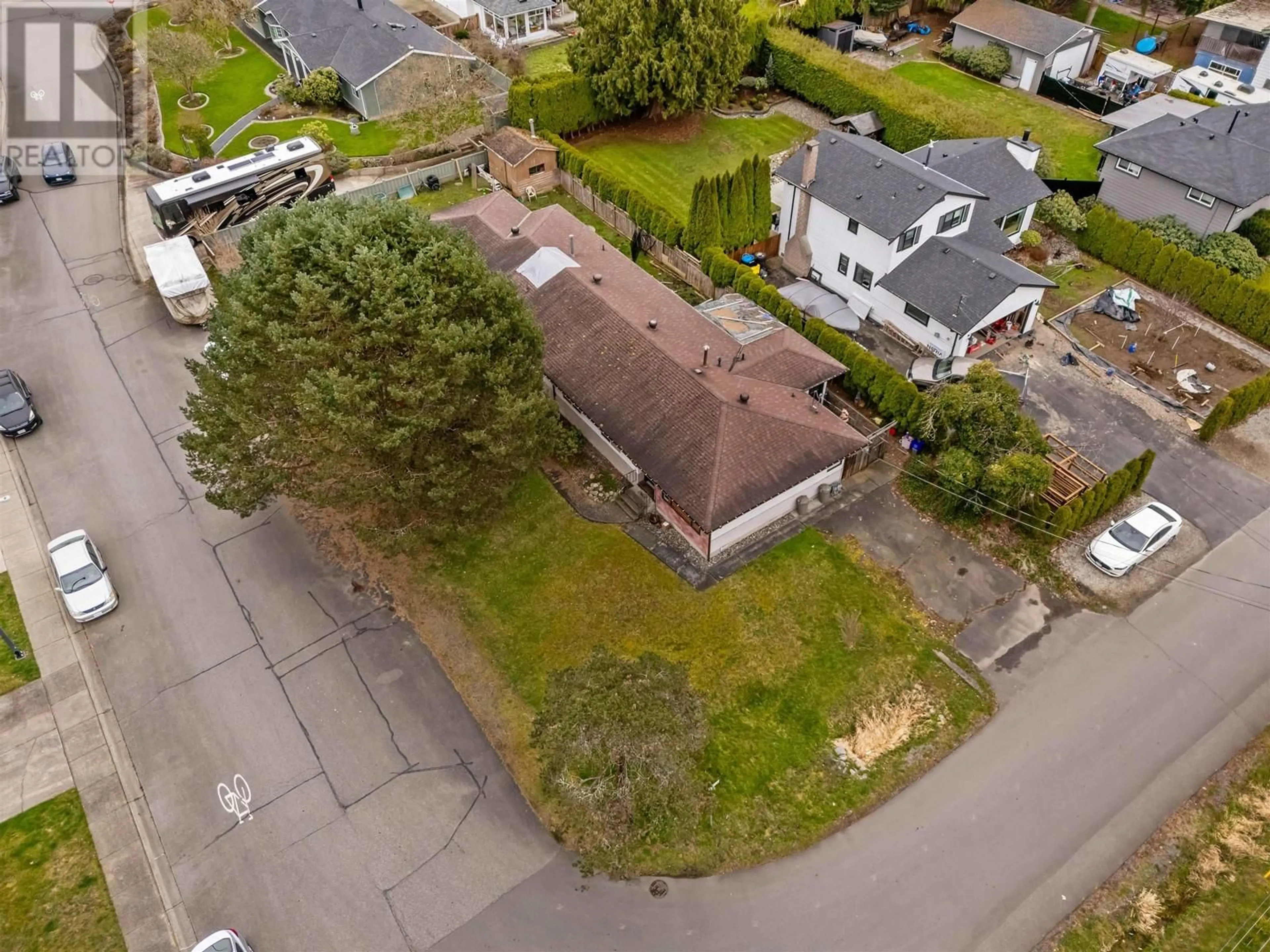 A pic from outside/outdoor area/front of a property/back of a property/a pic from drone, street for 1 - 23338 122 AVENUE, Maple Ridge British Columbia V2X3Y7