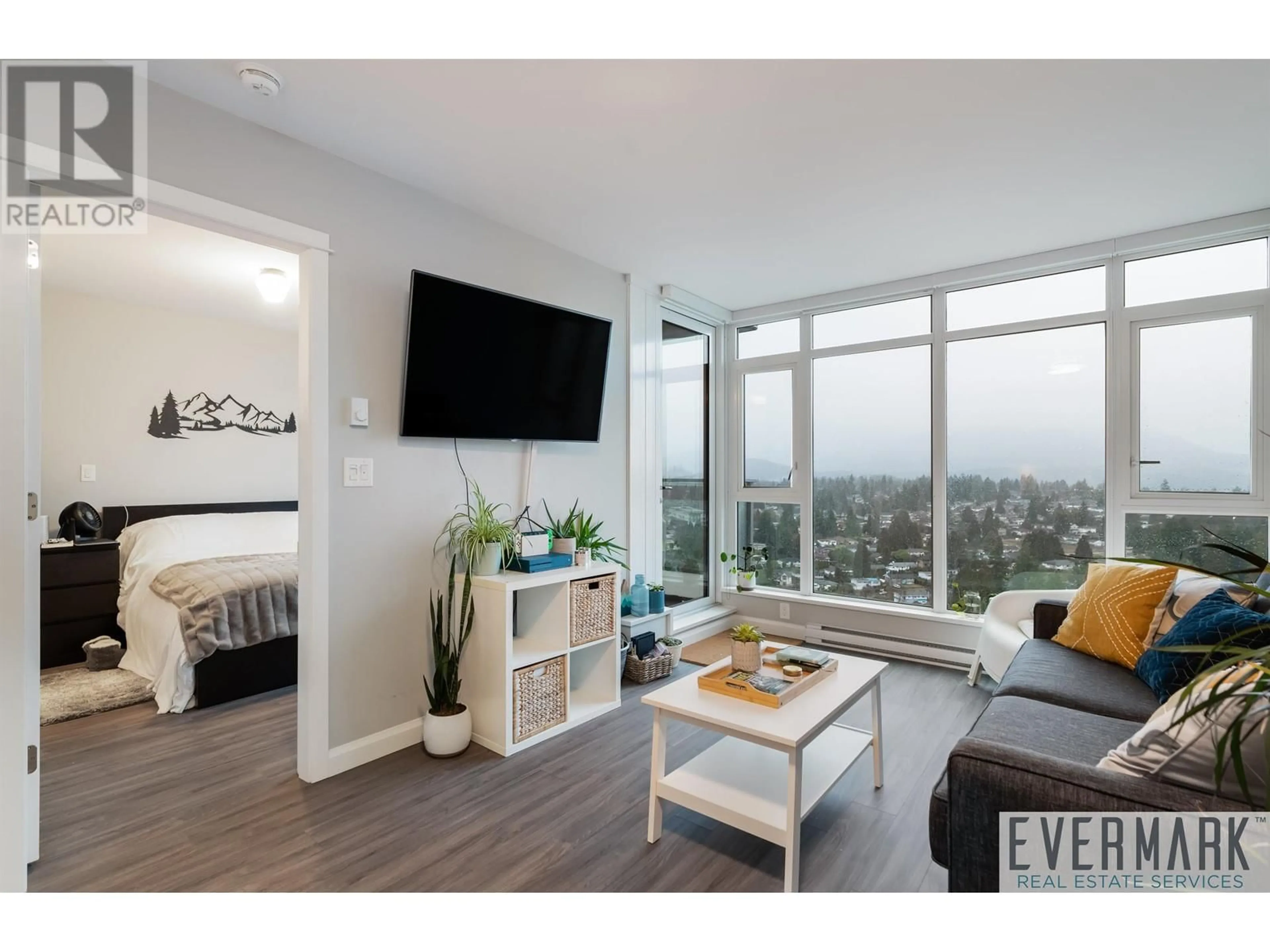 Living room with furniture, wood/laminate floor for 2506 - 520 COMO LAKE AVENUE, Coquitlam British Columbia V3J0E8