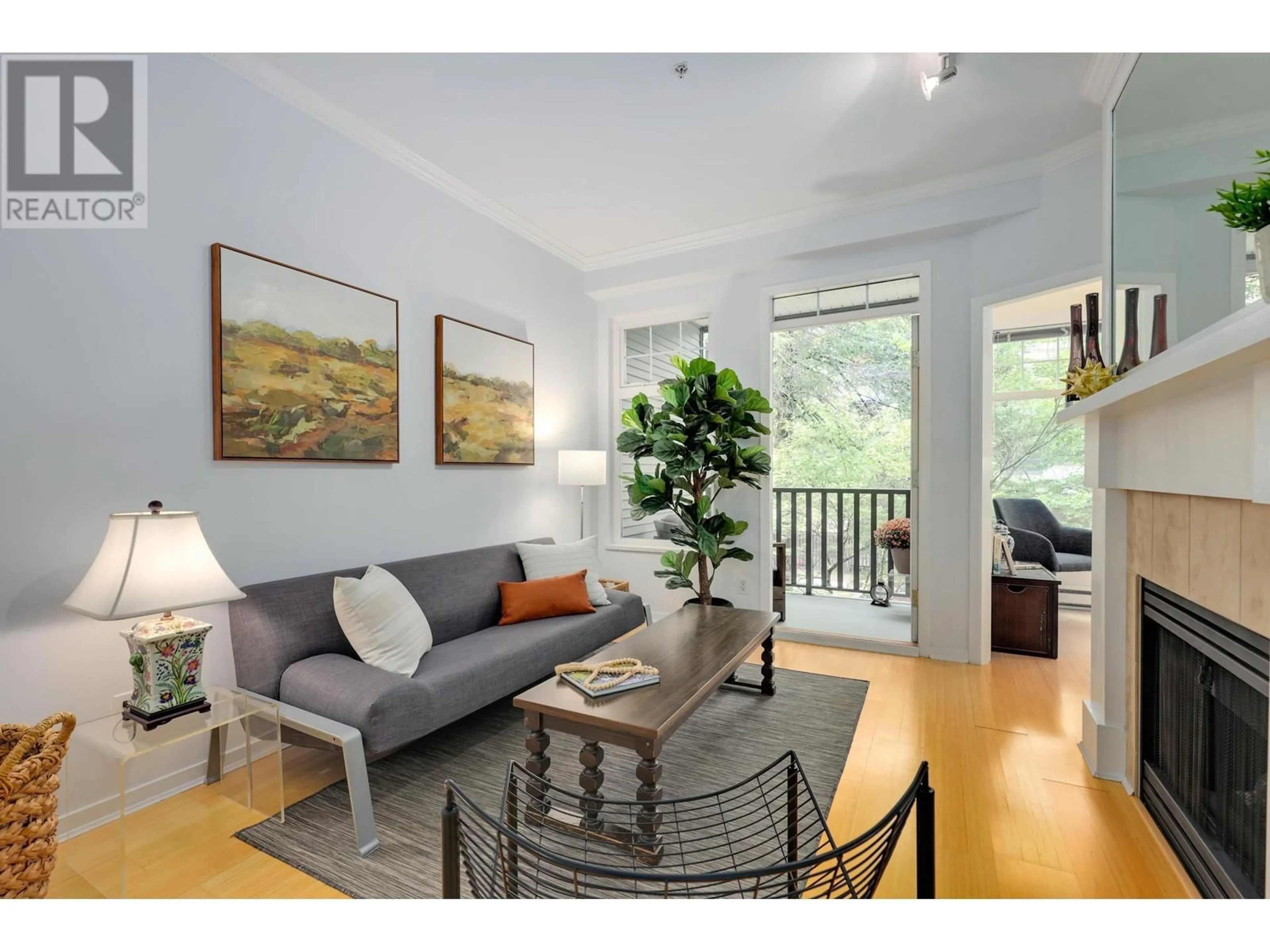 Living room with furniture, wood/laminate floor for 304 - 1388 NELSON STREET, Vancouver British Columbia V6E1J9