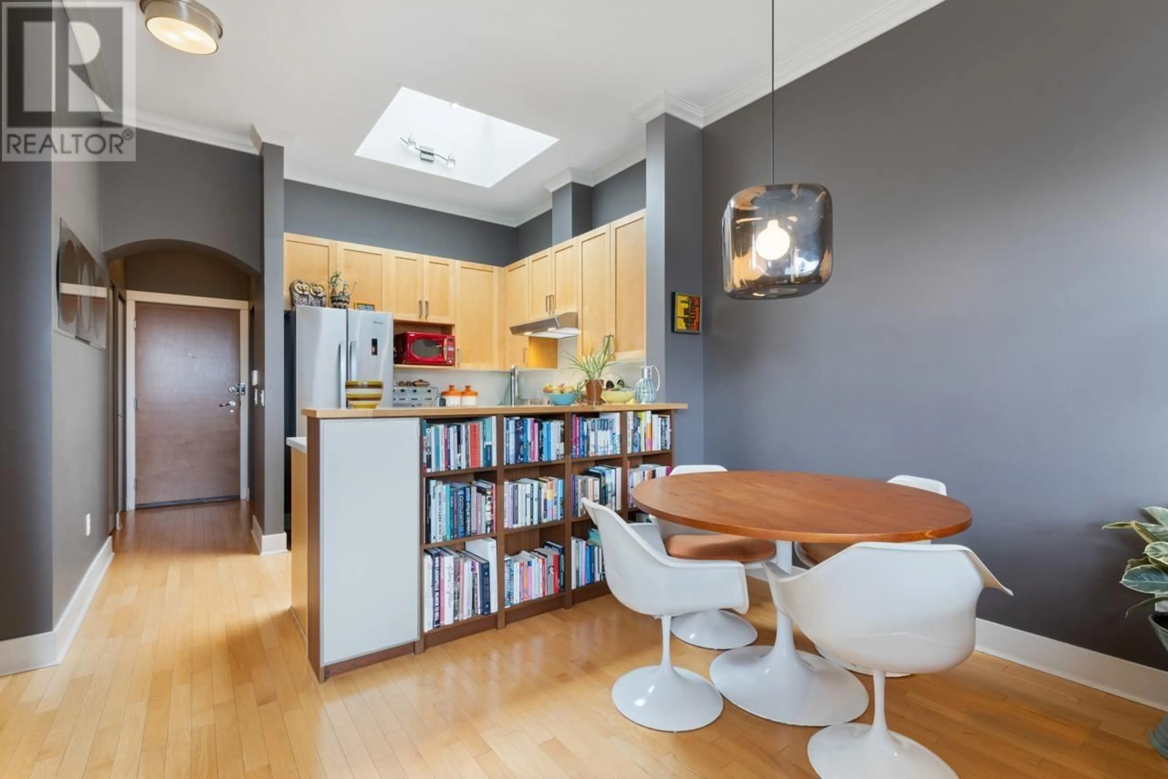 Open concept kitchen, wood/laminate floor for 407 - 1858 5TH AVENUE, Vancouver British Columbia V6J1P3