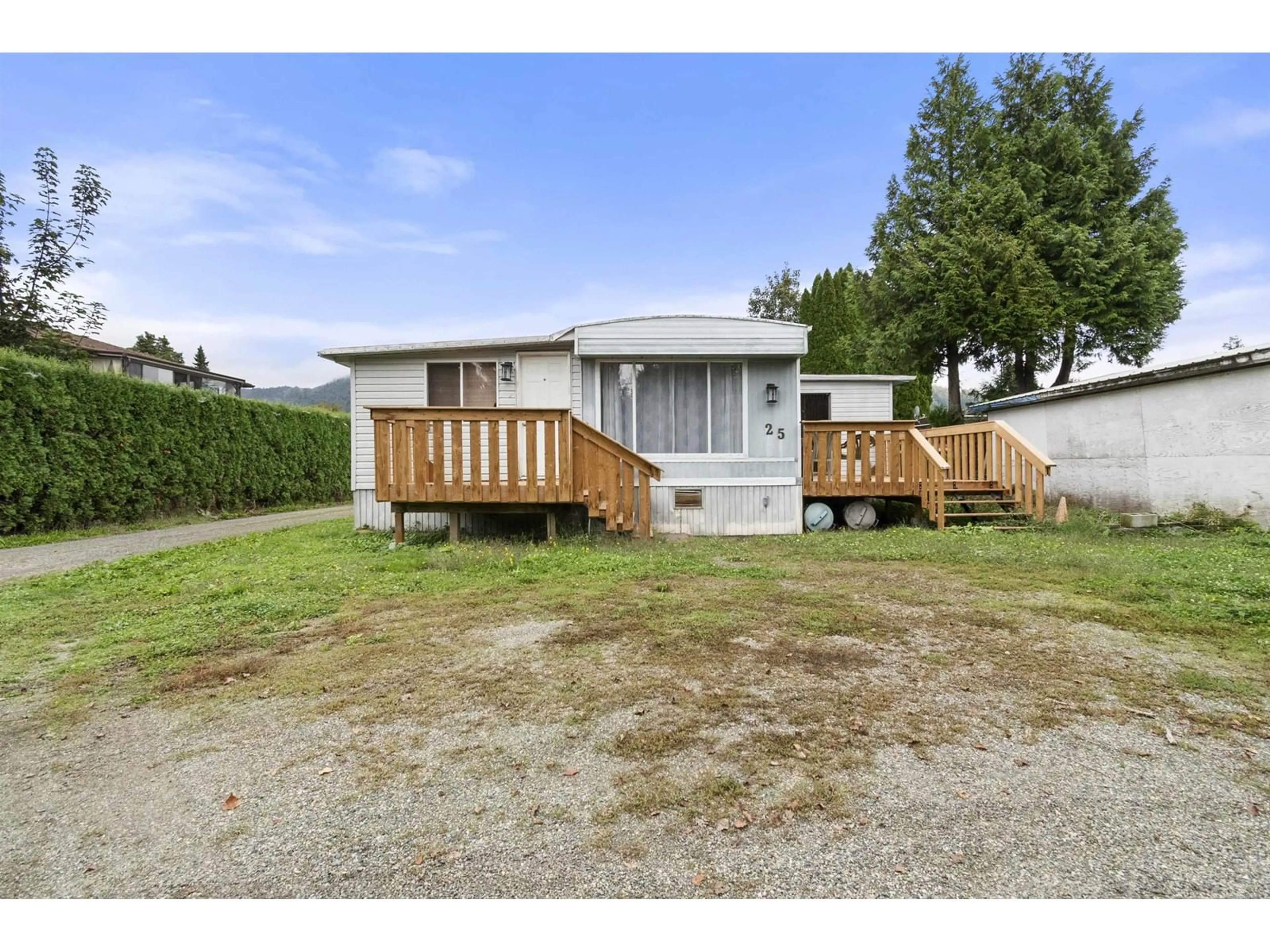 A pic from outside/outdoor area/front of a property/back of a property/a pic from drone, street for 25 - 6900 INKMAN ROAD, Agassiz British Columbia V0M1A1