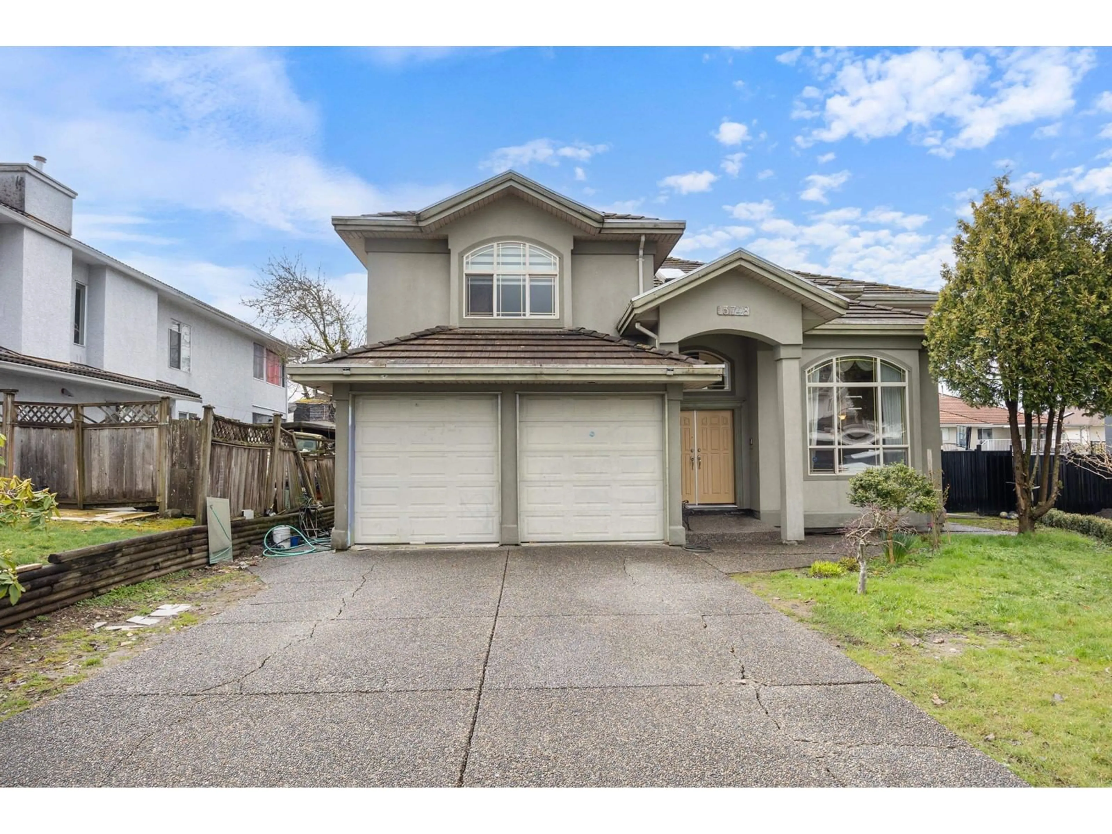 Home with vinyl exterior material, street for 13748 91A, Surrey British Columbia V3V5Y7