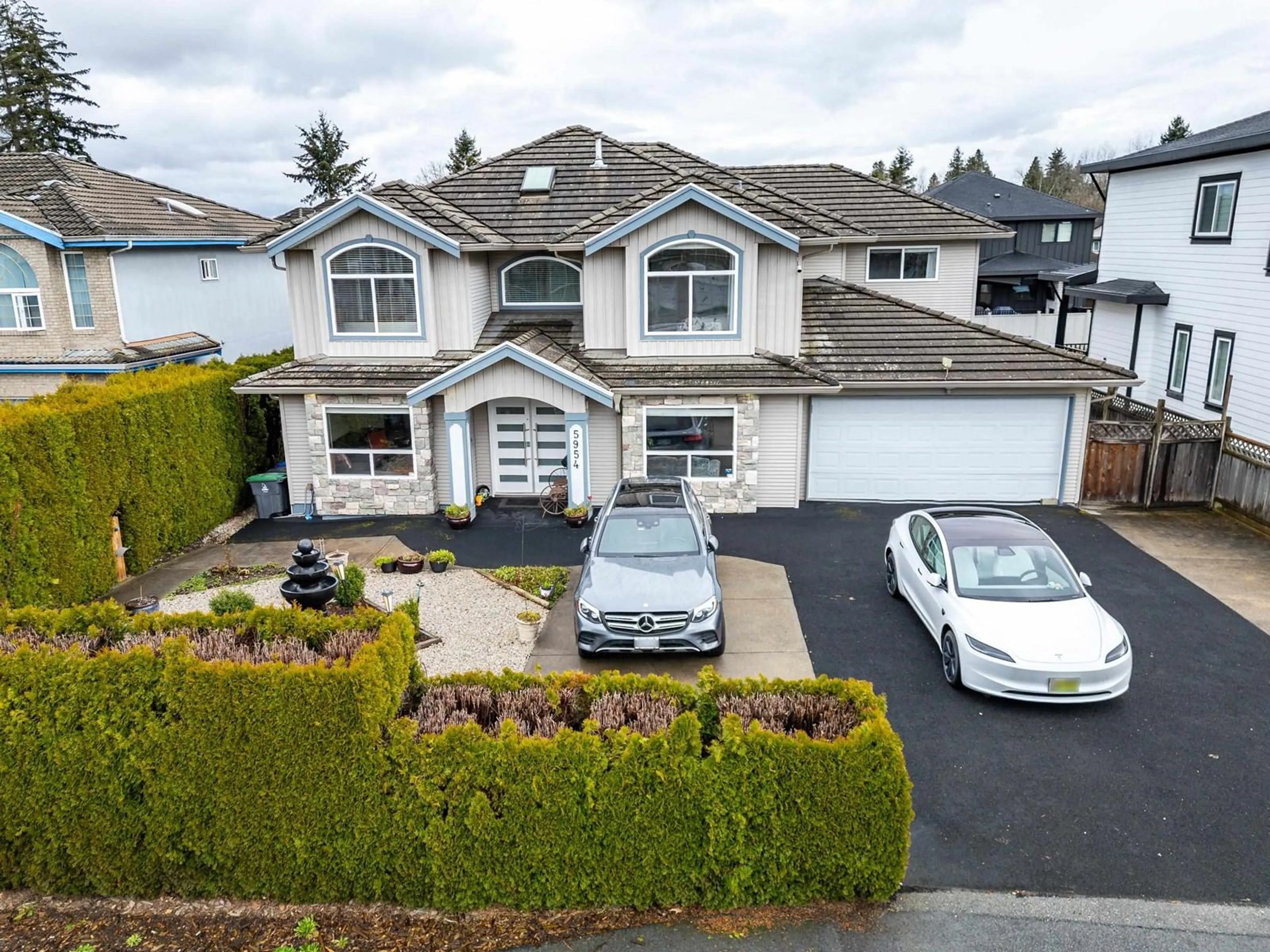 A pic from outside/outdoor area/front of a property/back of a property/a pic from drone, street for 5954 168TH STREET, Surrey British Columbia V3S3X6