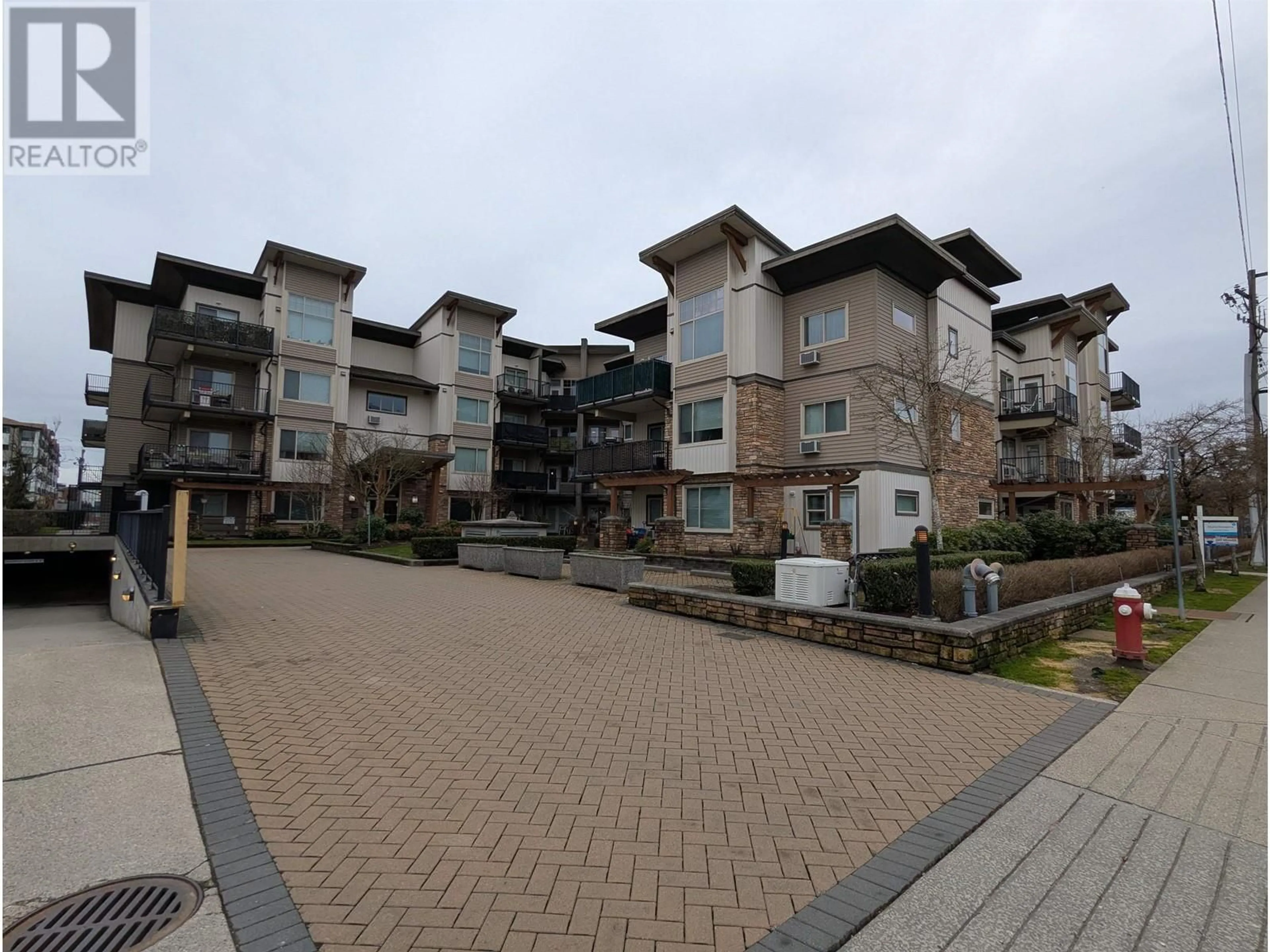 A pic from outside/outdoor area/front of a property/back of a property/a pic from drone, unknown for 306 - 11935 BURNETT STREET, Maple Ridge British Columbia V2X9A9