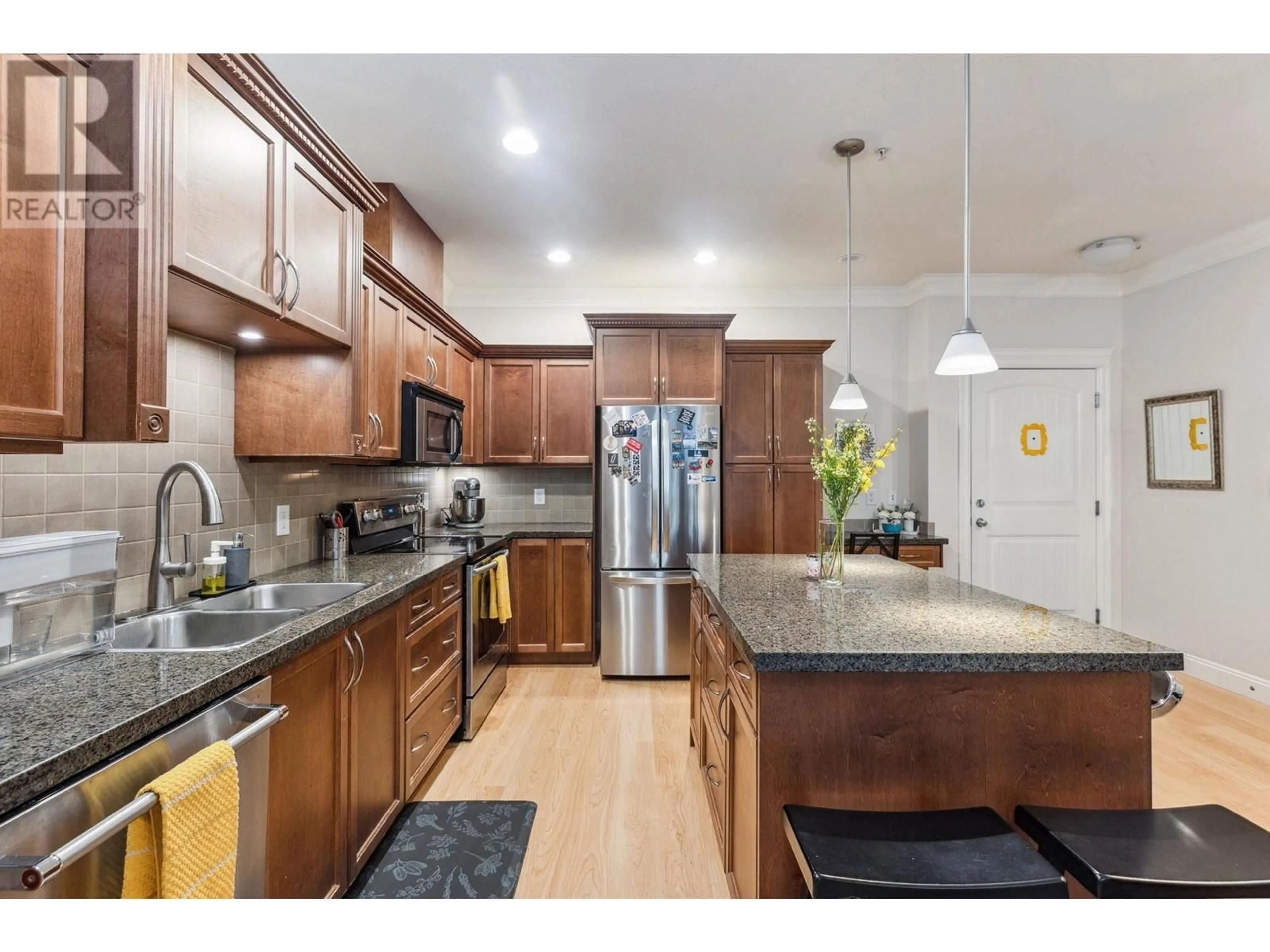 Open concept kitchen, unknown for 106 - 22150 DEWDNEY TRUNK ROAD, Maple Ridge British Columbia V2X3H6