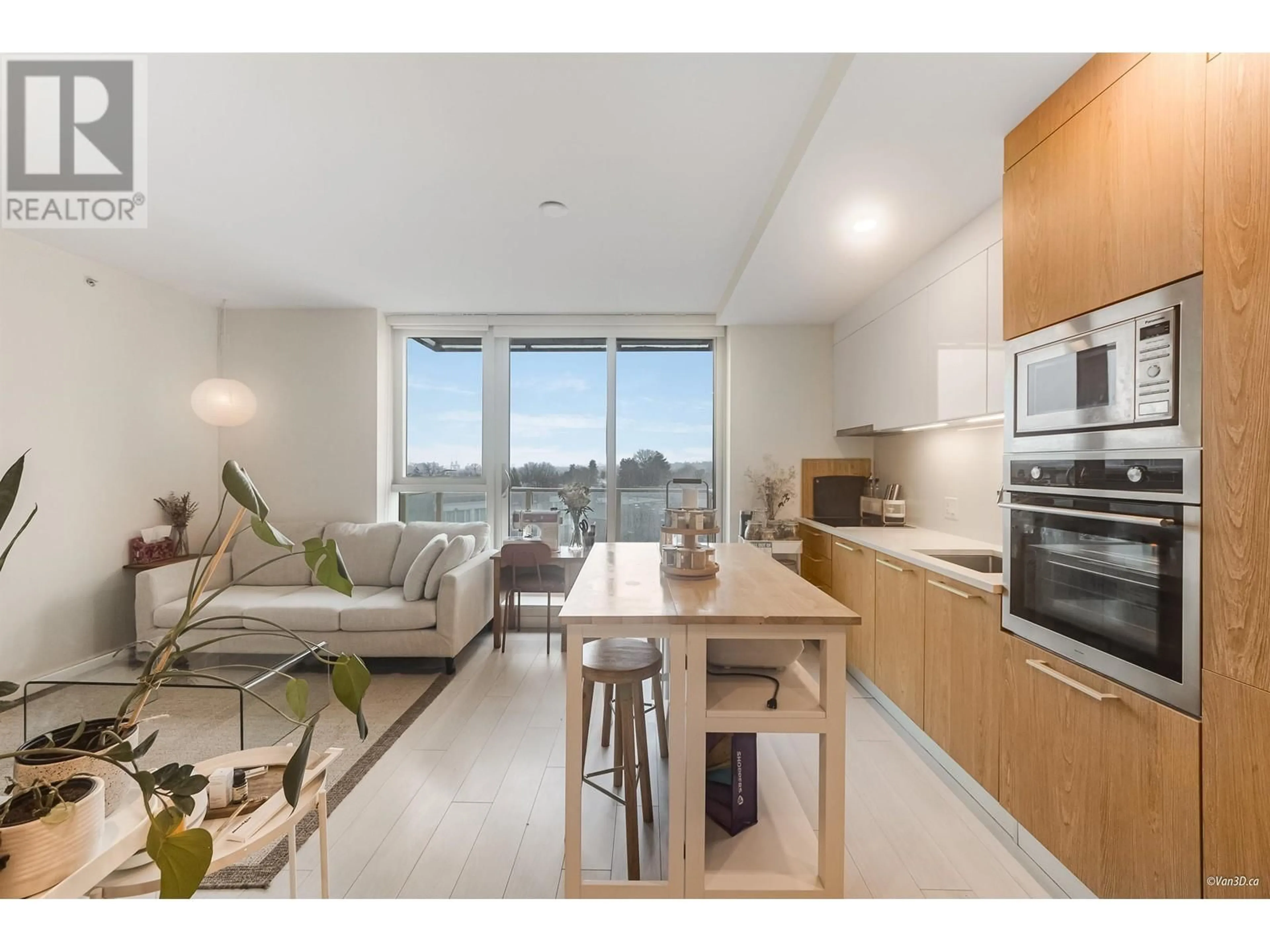 Open concept kitchen, wood/laminate floor for 306 - 2508 WATSON STREET, Vancouver British Columbia V5T3G9