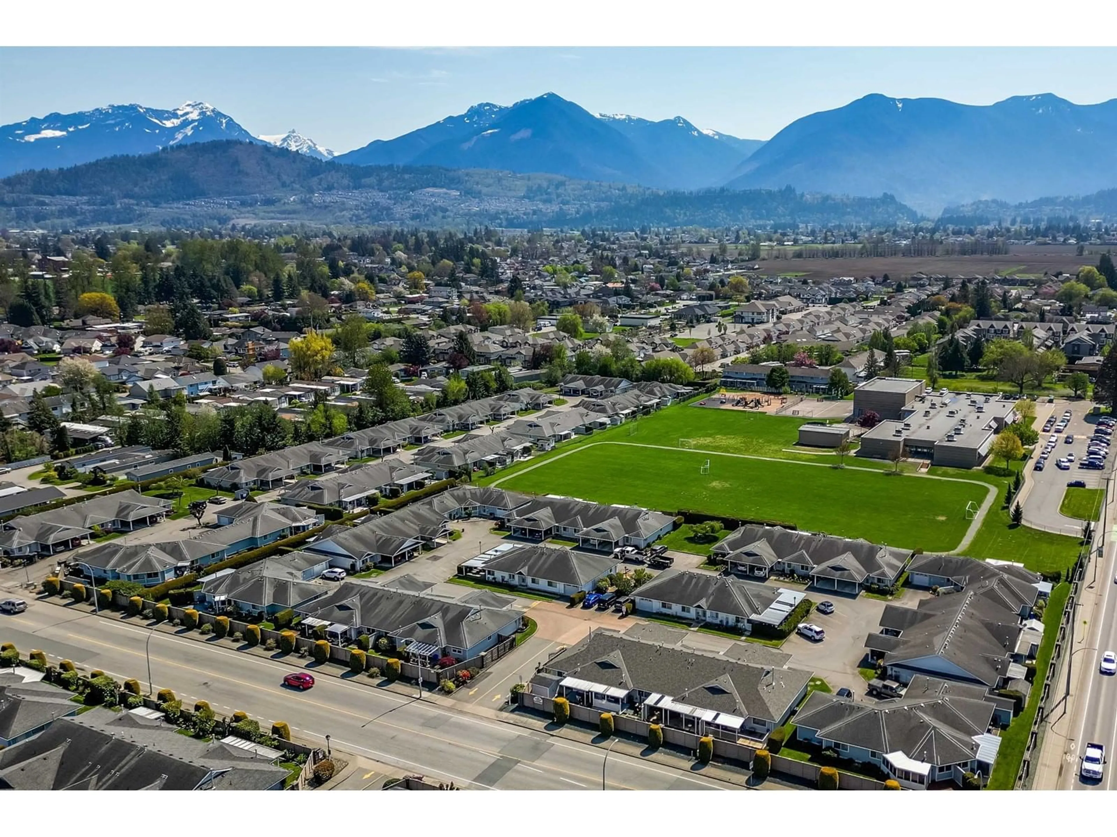 A pic from outside/outdoor area/front of a property/back of a property/a pic from drone, mountain view for 106 - 7610 EVANS ROAD, Chilliwack British Columbia V2R2X8