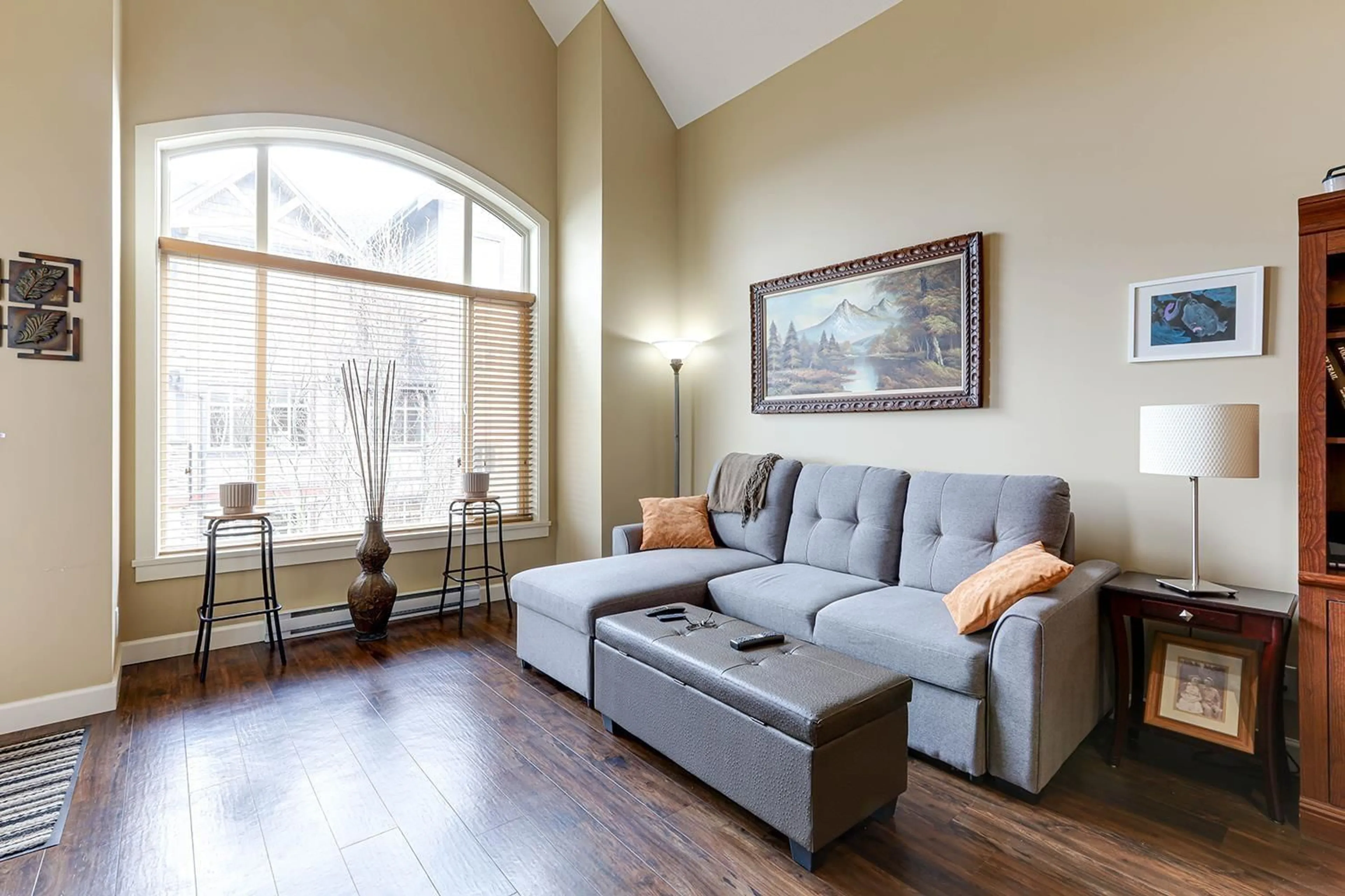 Living room with furniture, wood/laminate floor for 404 - 8328 207A, Langley British Columbia V2Y0K5