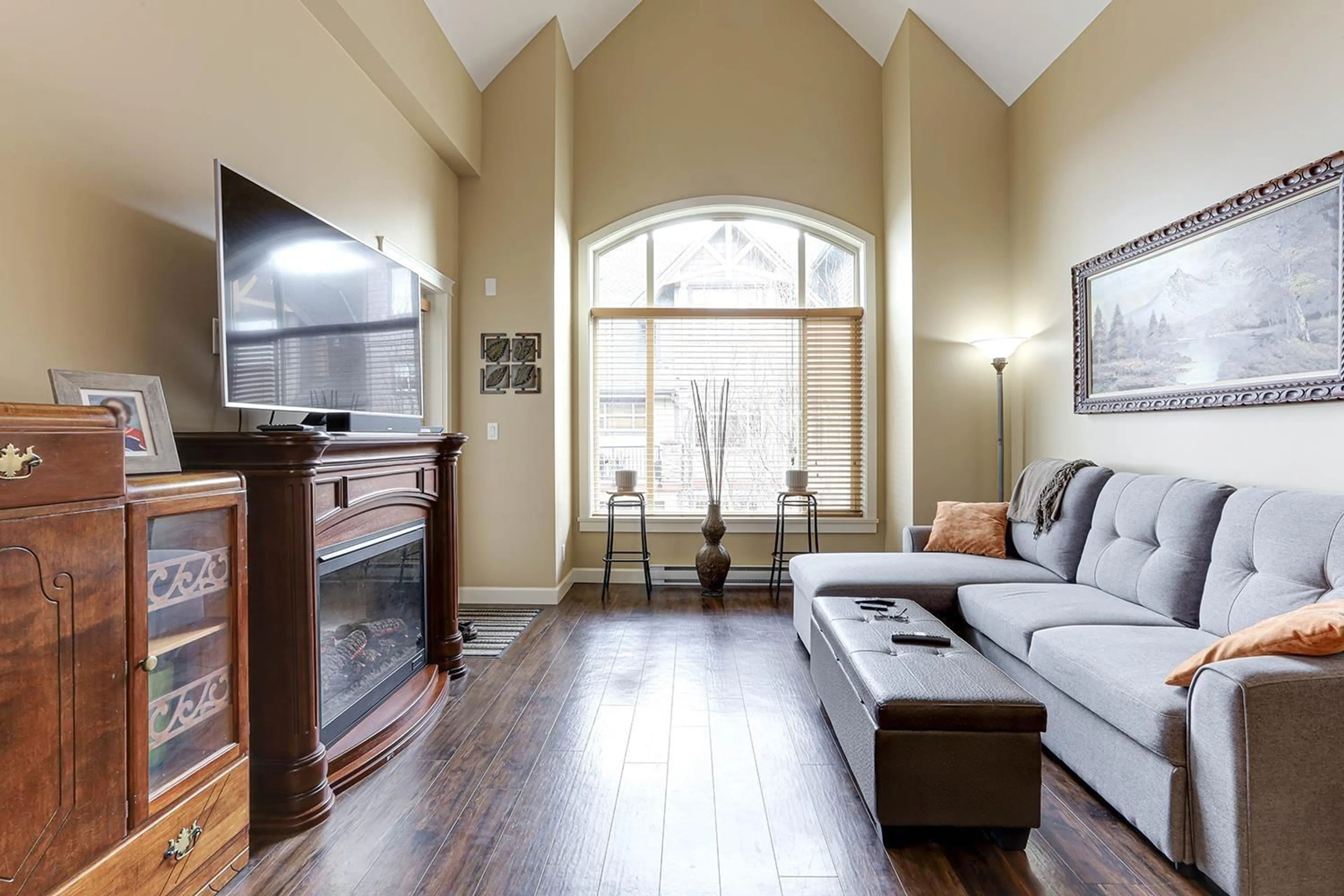 Living room with furniture, wood/laminate floor for 404 - 8328 207A, Langley British Columbia V2Y0K5