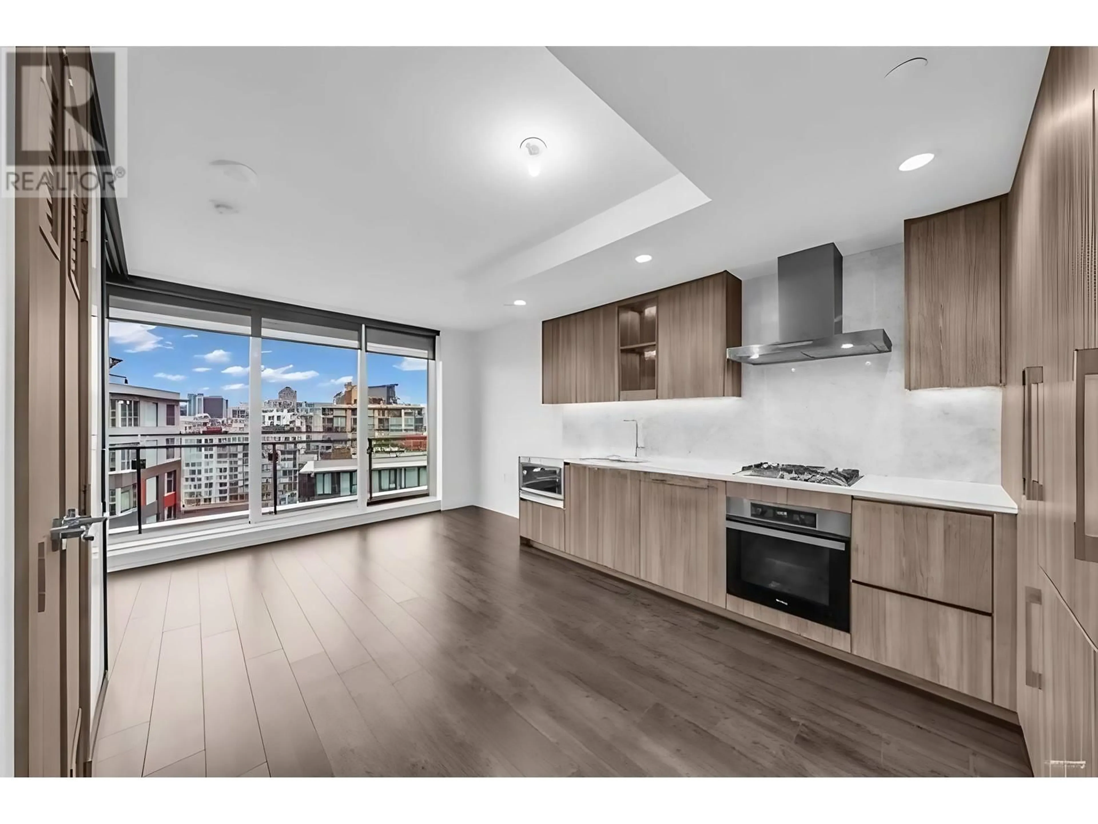 Open concept kitchen, wood/laminate floor for 1302 - 1768 COOK STREET, Vancouver British Columbia V5Y0N3