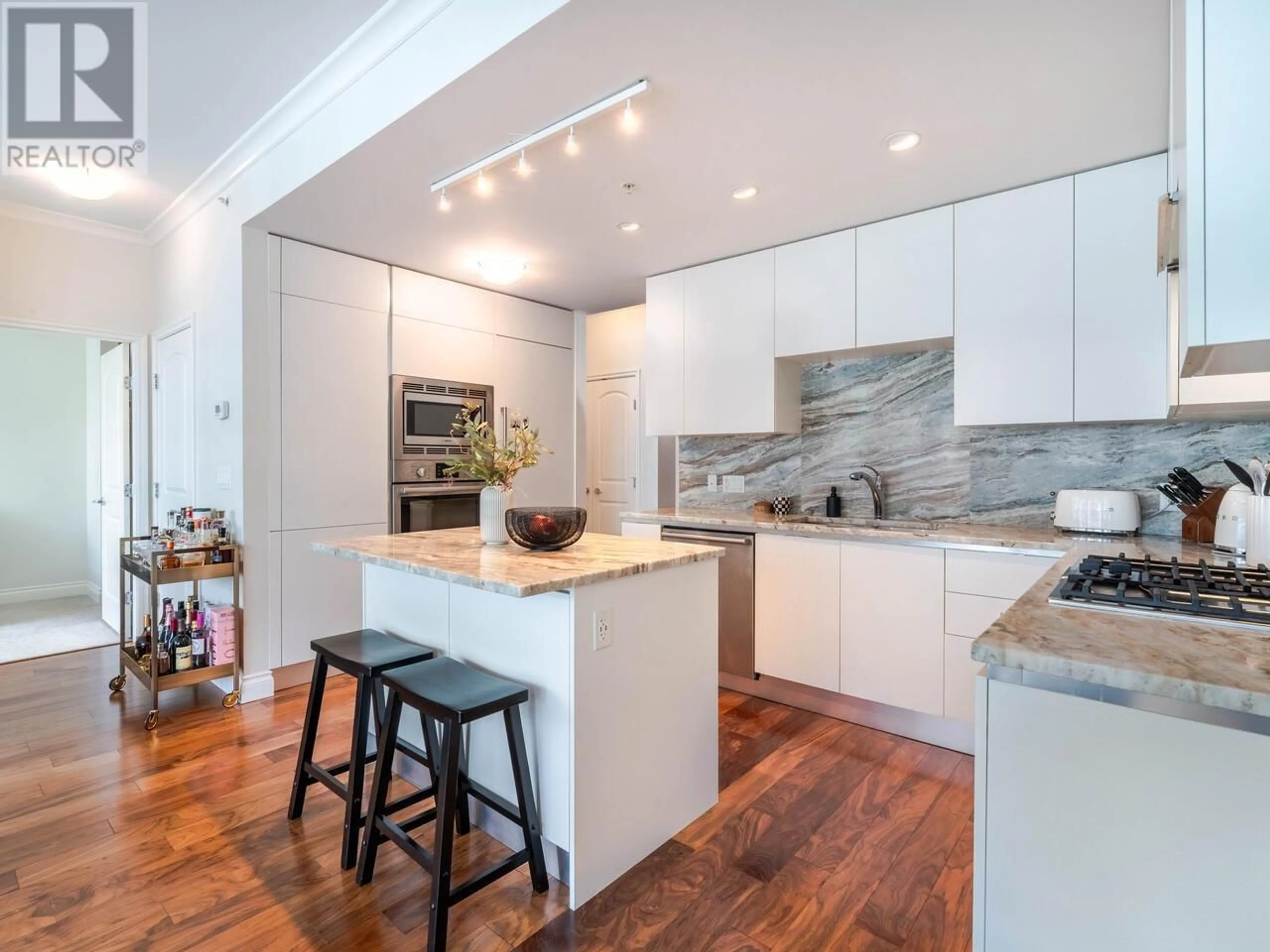 Contemporary kitchen, unknown for 604 - 185 VICTORY SHIP WAY, North Vancouver British Columbia V7L0G2