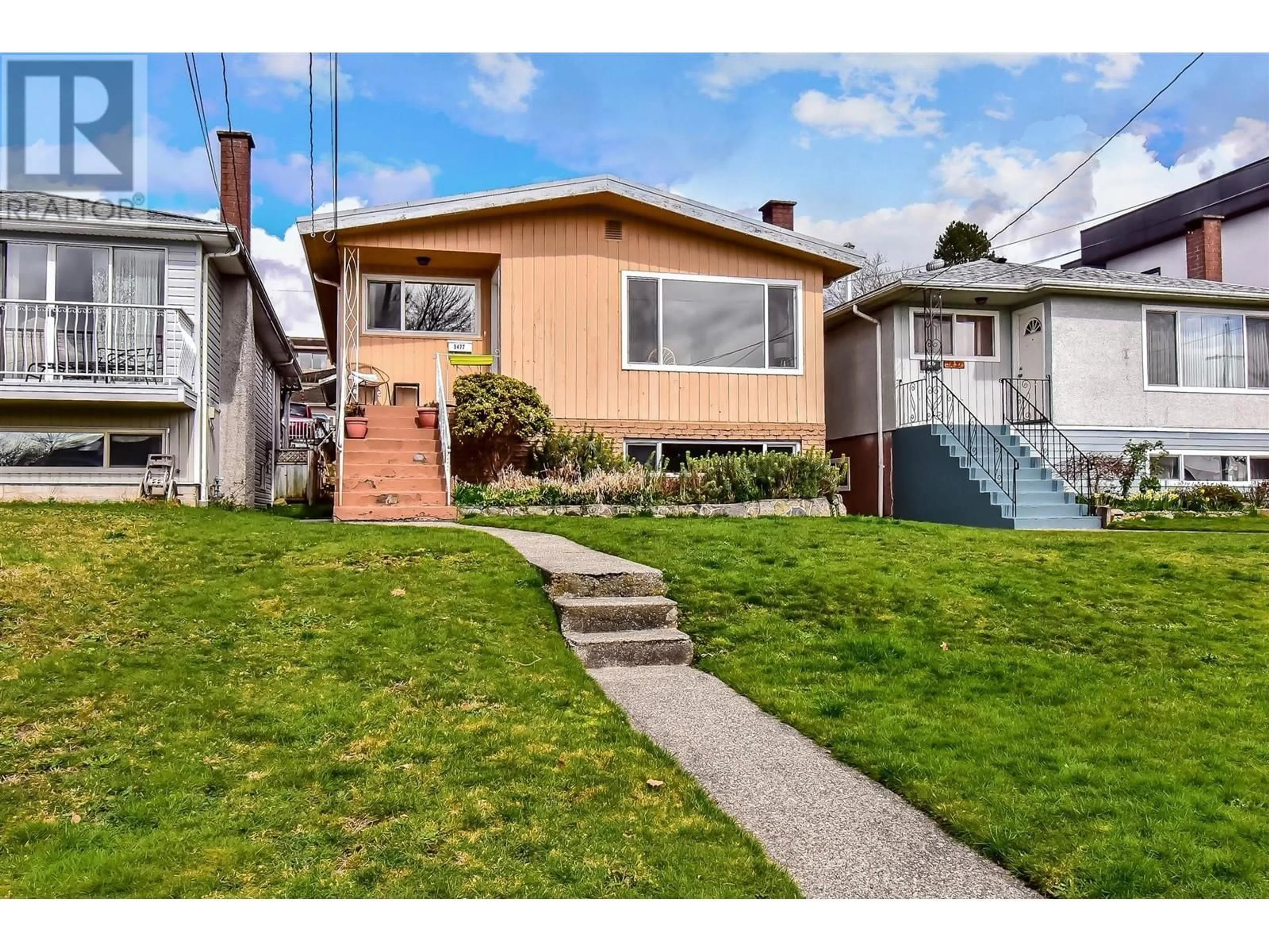 Home with vinyl exterior material, street for 5477 PORTLAND STREET, Burnaby British Columbia V5J2R5
