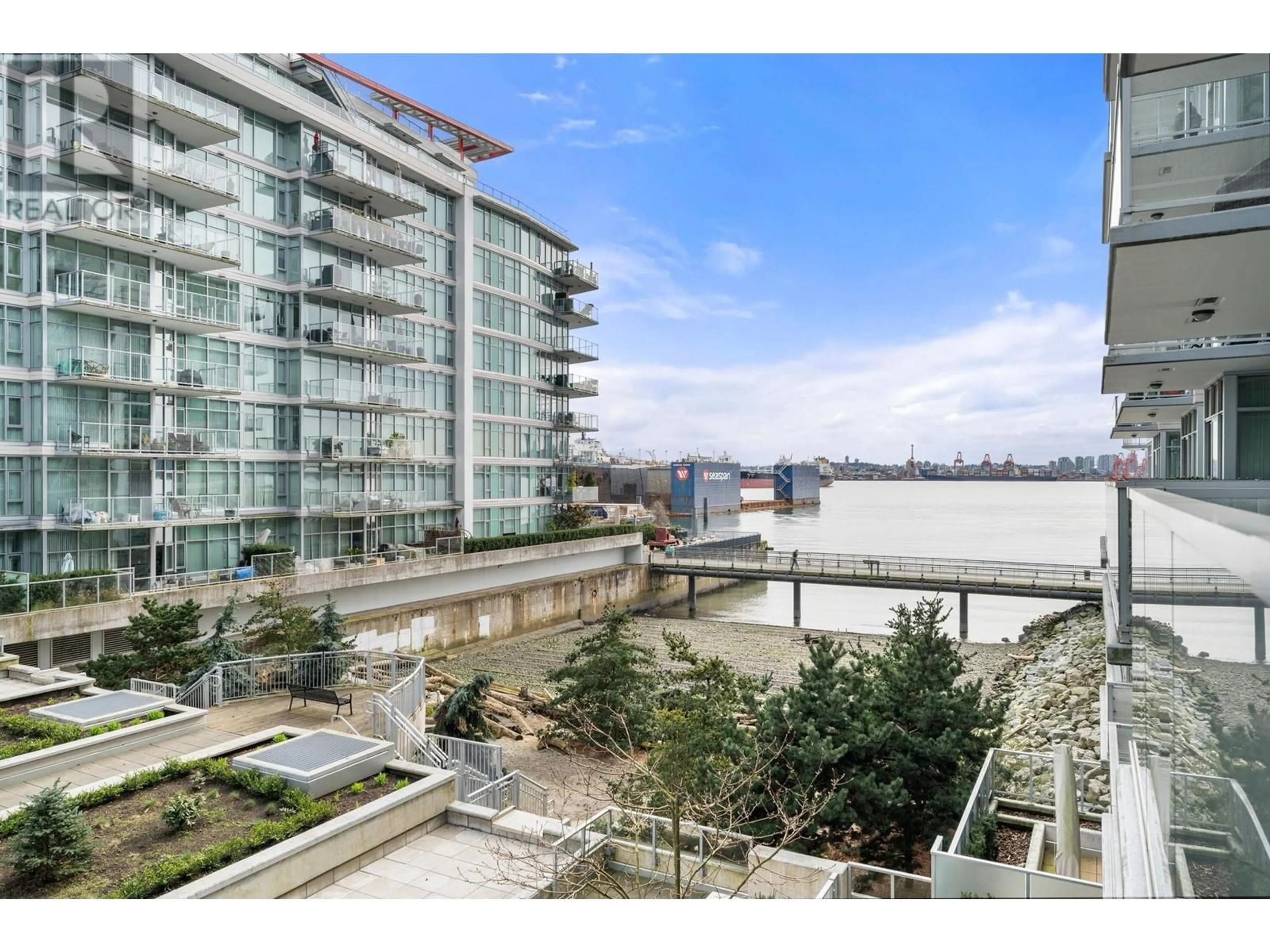 Patio, water/lake/river/ocean view for 313 - 175 VICTORY SHIP WAY, North Vancouver British Columbia V7L0G1