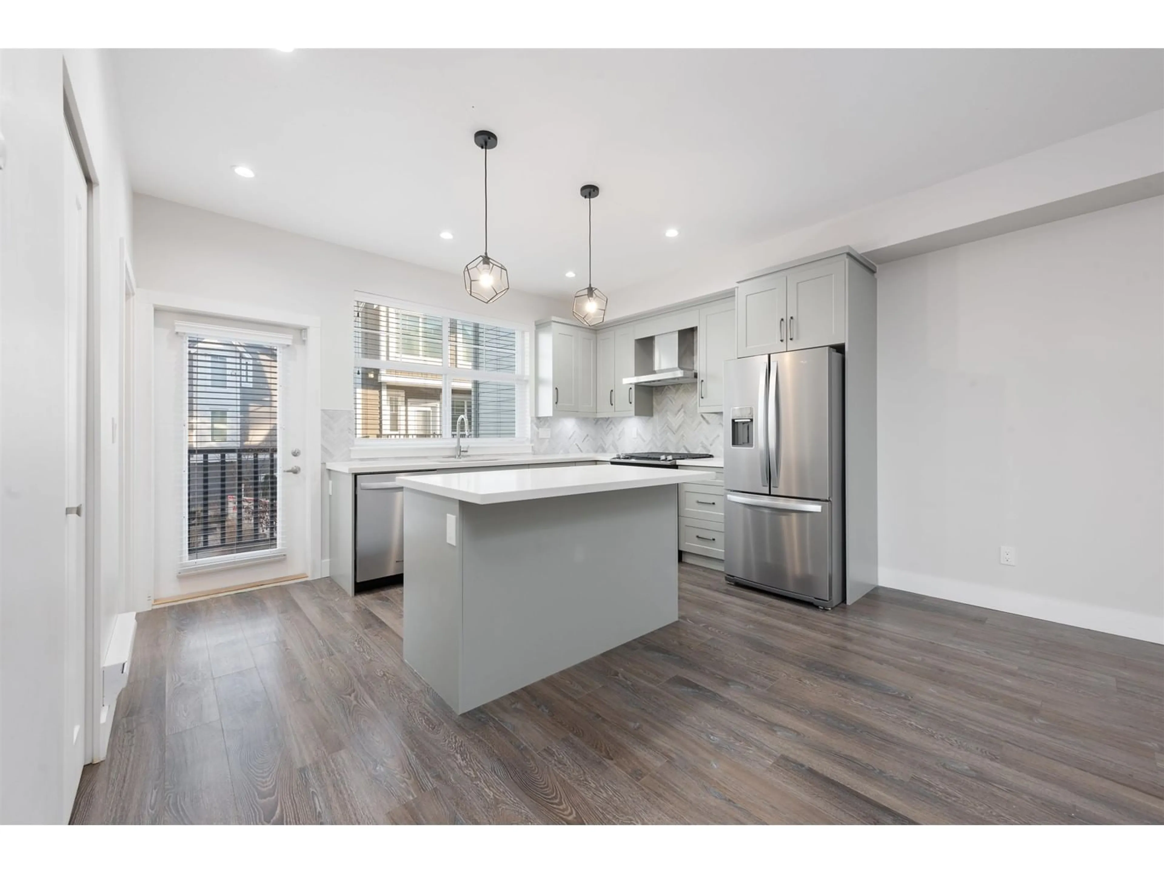 Open concept kitchen, wood/laminate floor for 63 - 14541 WINTER, Surrey British Columbia V4P0G5
