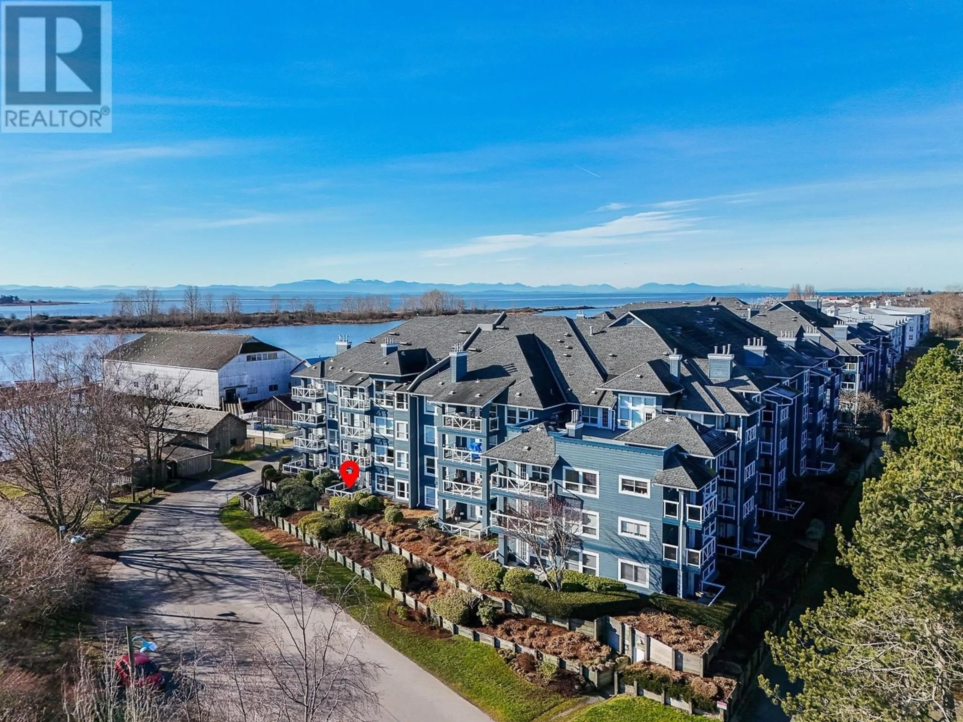 A pic from outside/outdoor area/front of a property/back of a property/a pic from drone, water/lake/river/ocean view for 125 12931 RAILWAY AVENUE, Richmond British Columbia V7E6M5