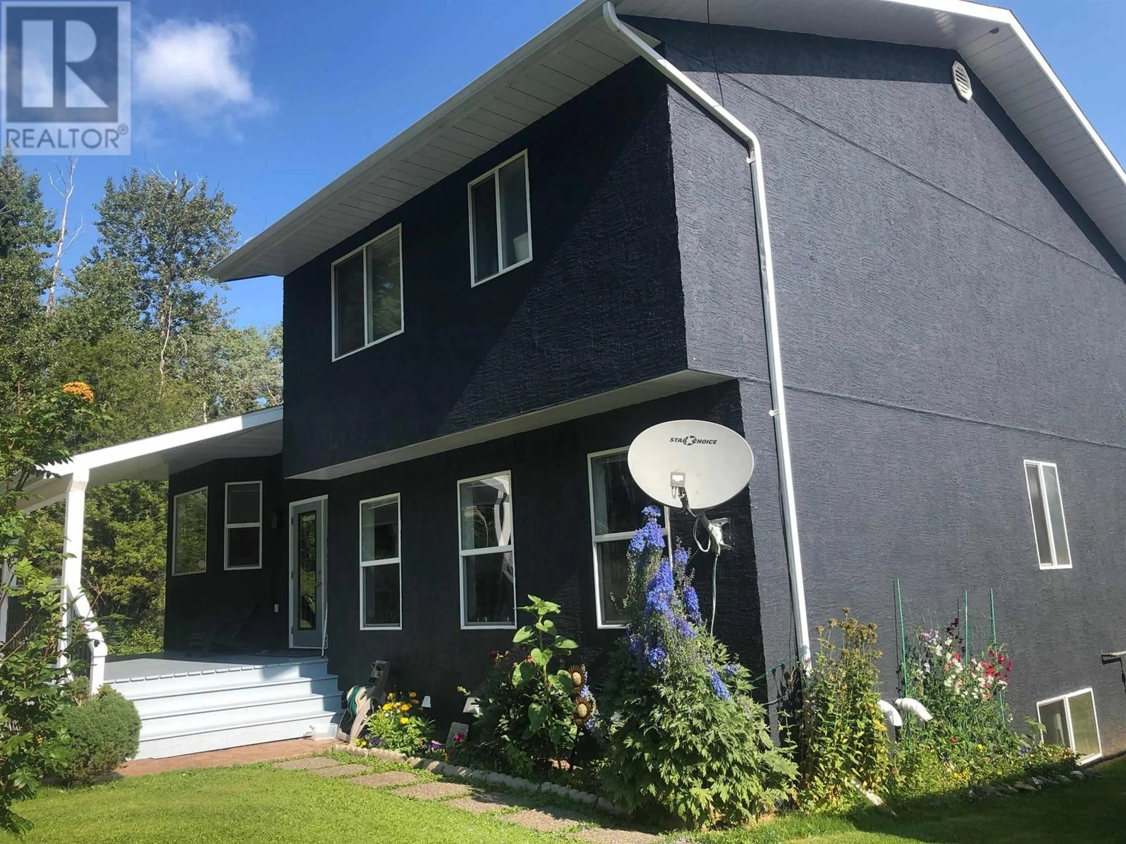 Home with vinyl exterior material, building for 415 BEACH ROAD, Burns Lake British Columbia V0J1E2