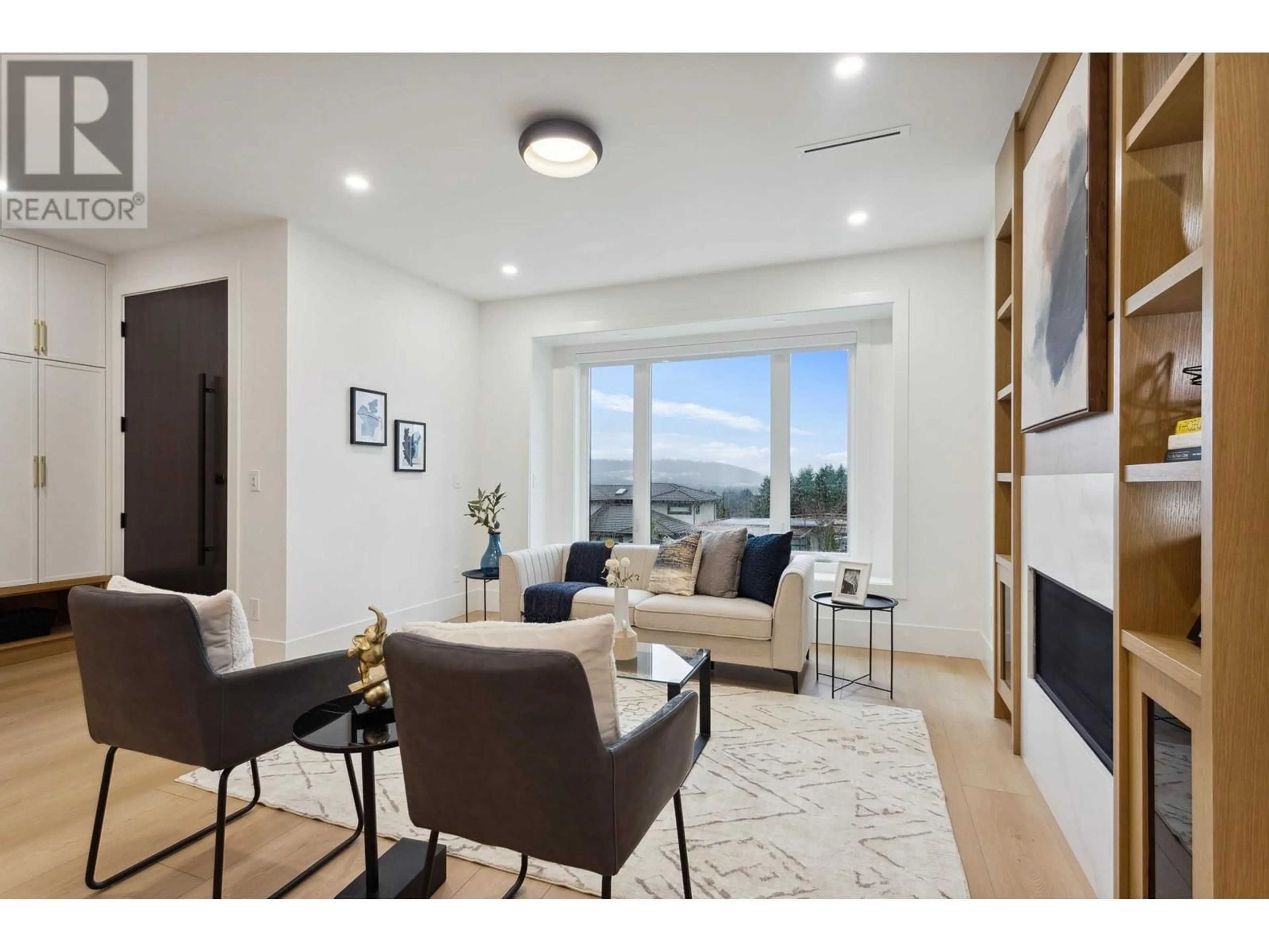 Living room with furniture, wood/laminate floor for 5717 FORGLEN DRIVE, Burnaby British Columbia V5H3K9