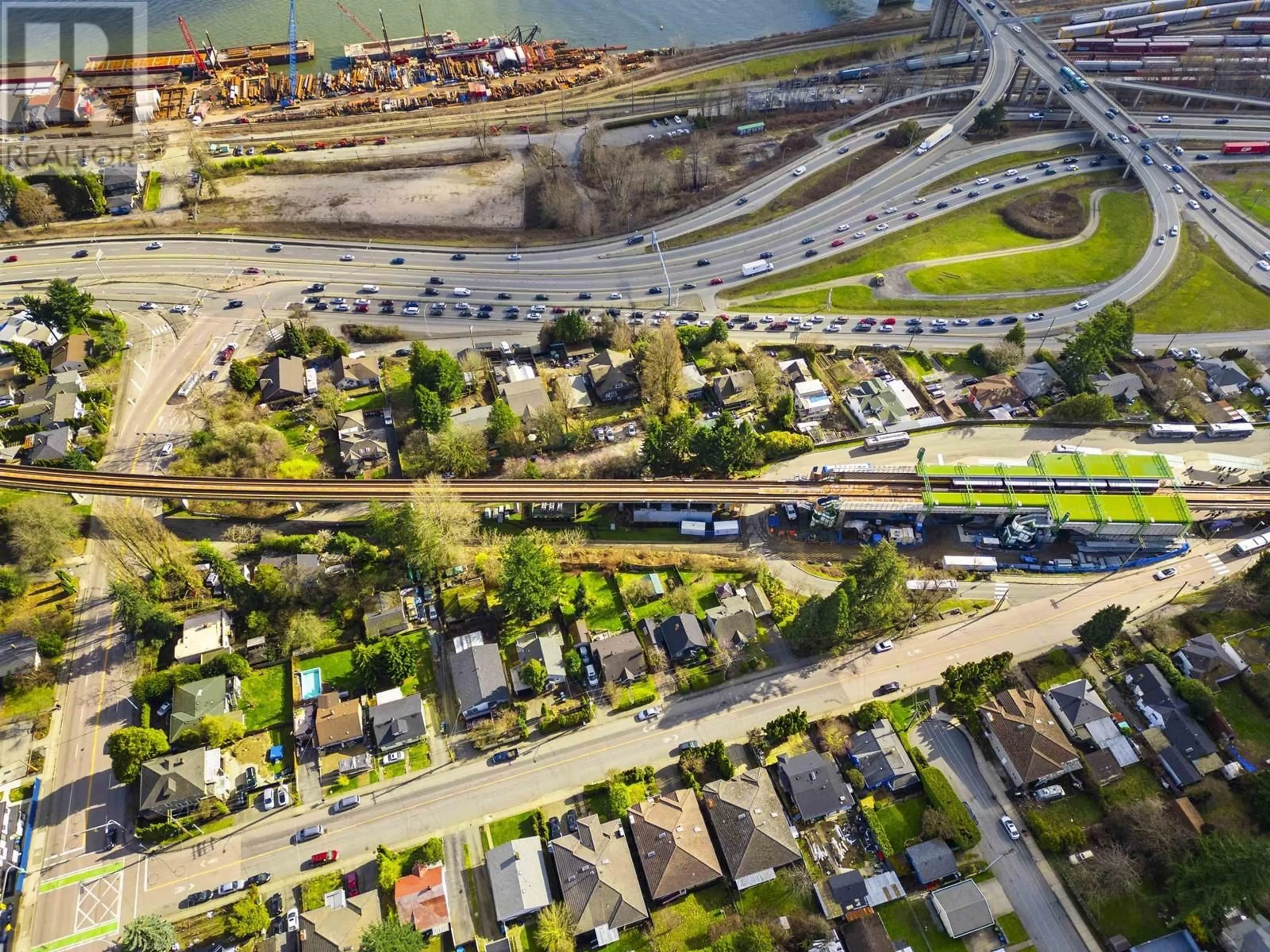 A pic from outside/outdoor area/front of a property/back of a property/a pic from drone, street for 2125 MARINE WAY, New Westminster British Columbia V3M2H2