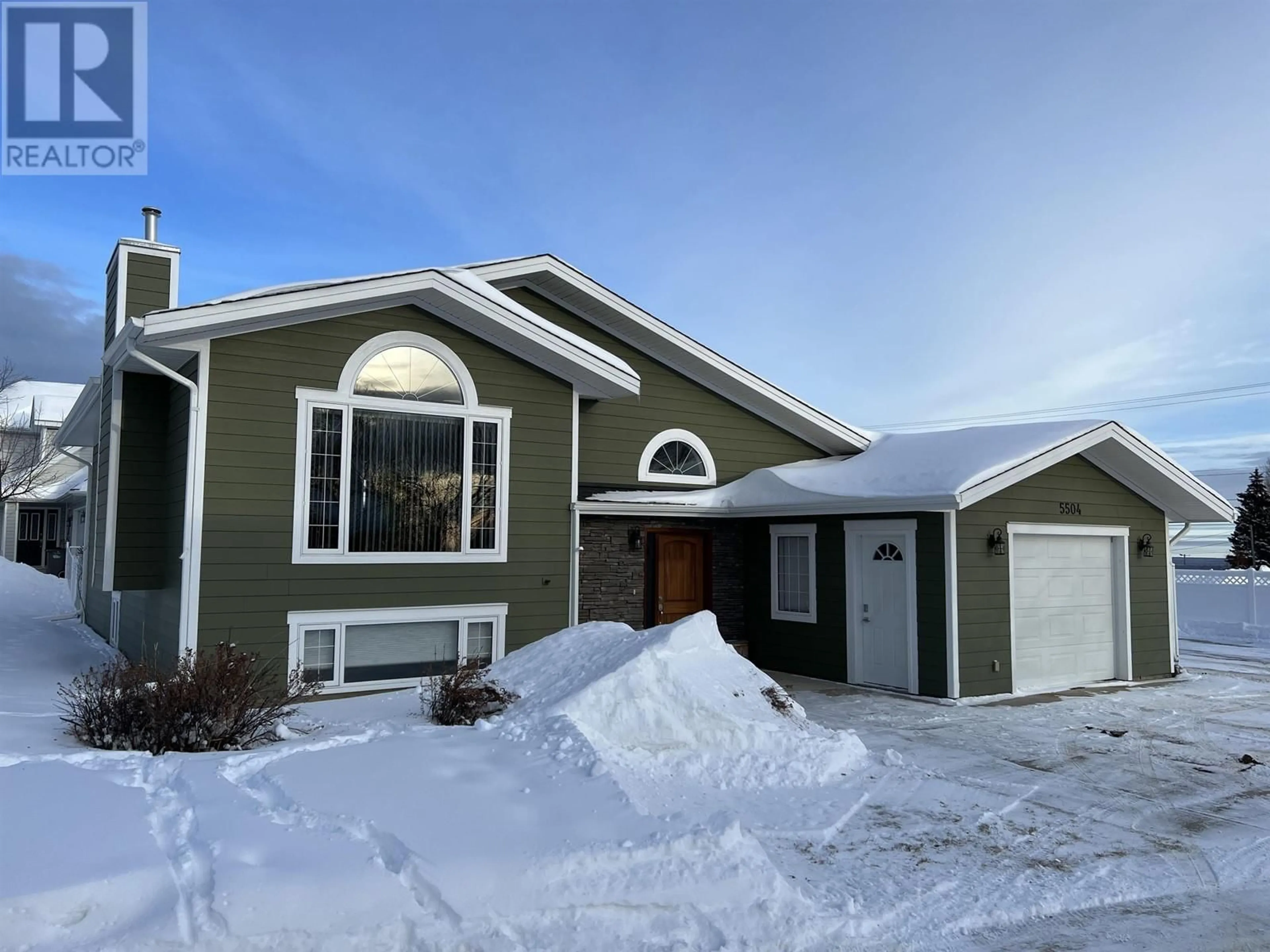 Home with vinyl exterior material, street for 5504 CHURCHILL AVENUE, Fort Nelson British Columbia V0C1R0