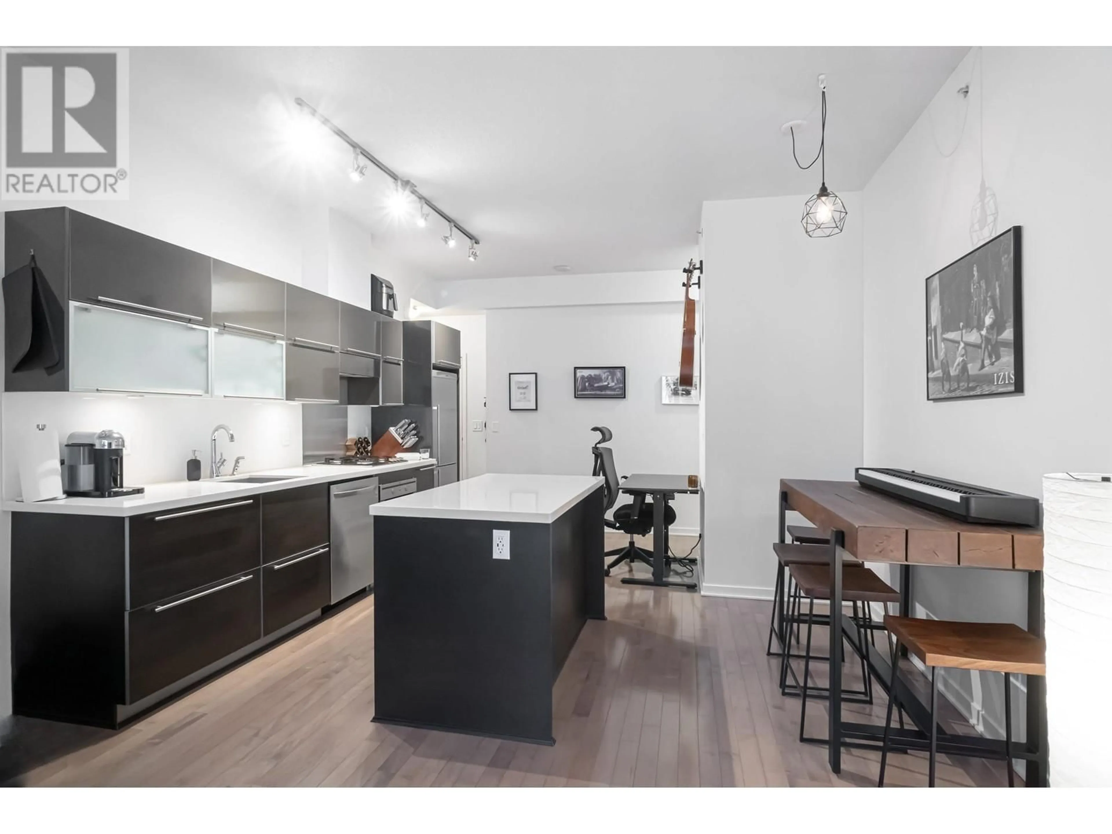 Open concept kitchen, wood/laminate floor for 201 - 1252 HORNBY STREET, Vancouver British Columbia V6Z0A3