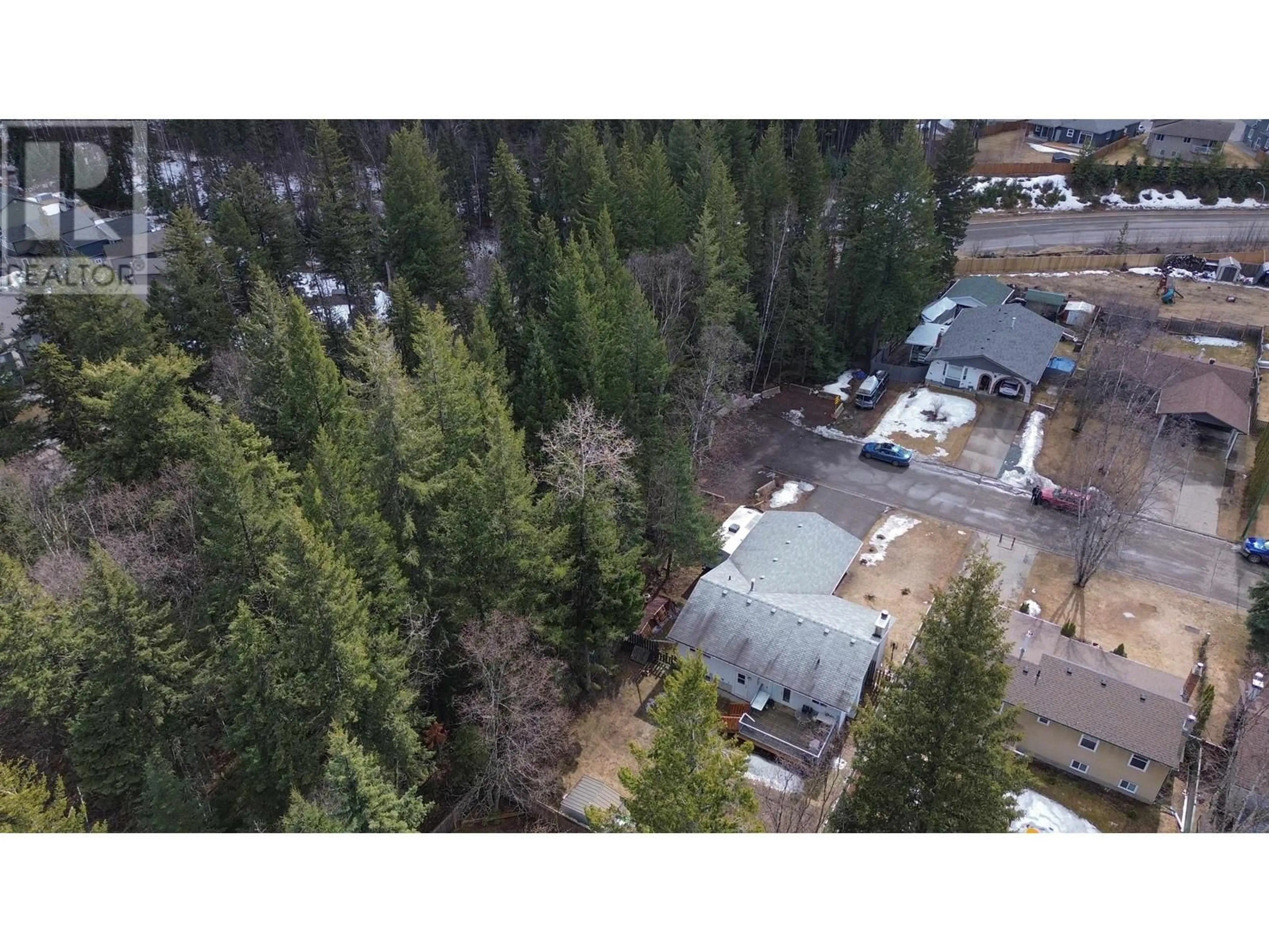 A pic from outside/outdoor area/front of a property/back of a property/a pic from drone, forest/trees view for 7750 LEMOYNE PLACE, Prince George British Columbia V2N3N1
