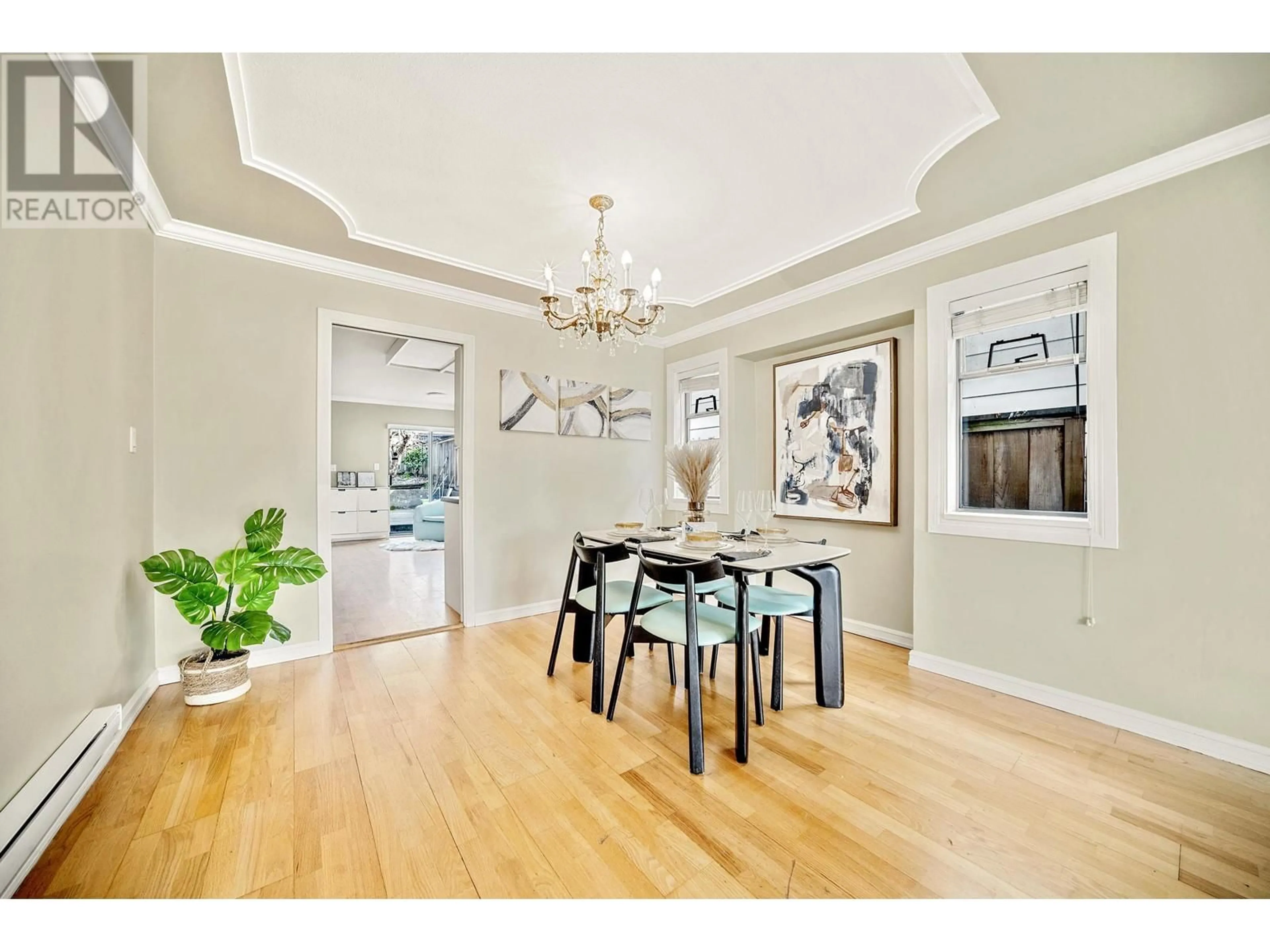 Dining room, wood/laminate floor for 1659 63RD AVENUE, Vancouver British Columbia V6P2H7