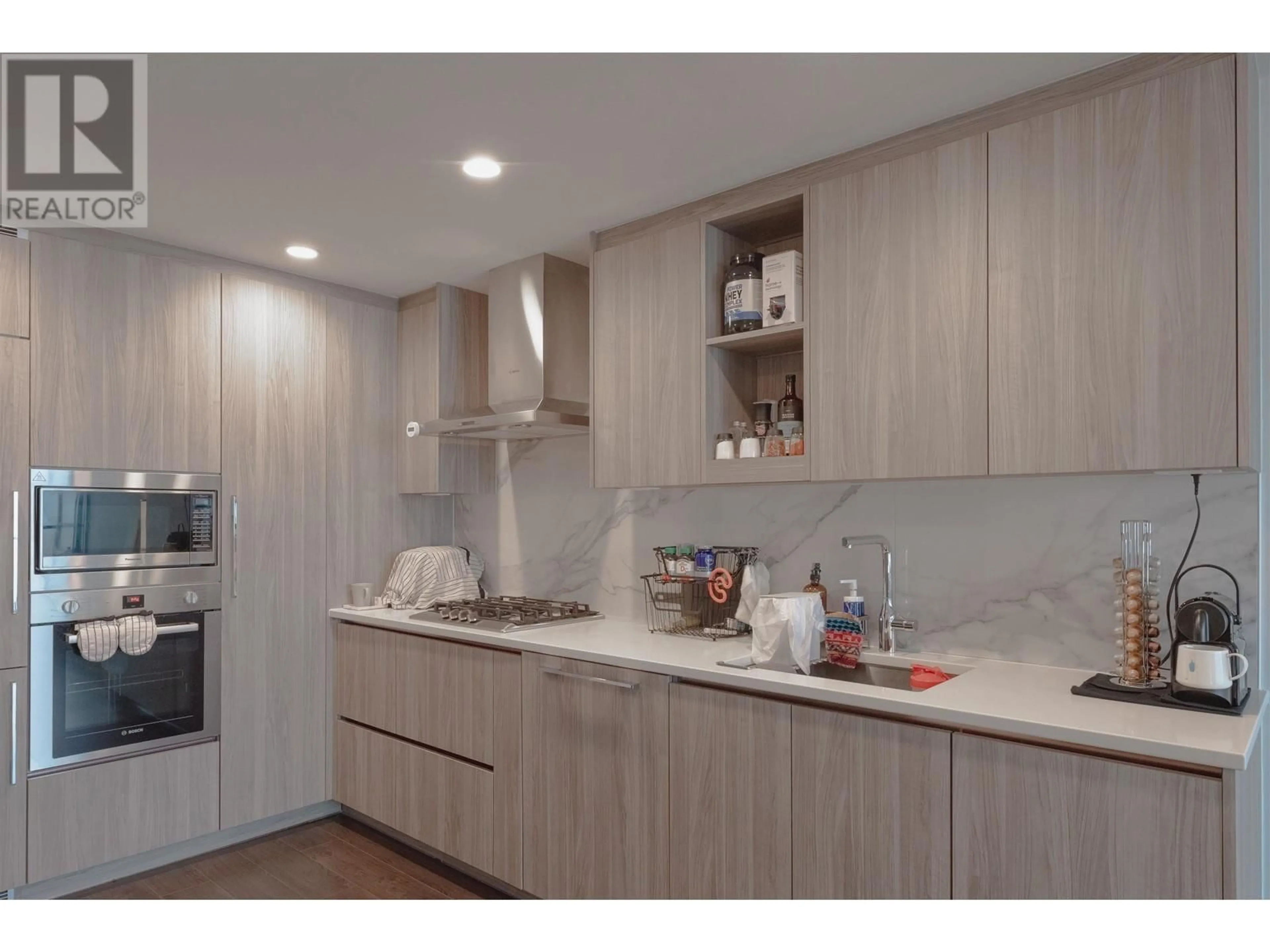 Contemporary kitchen, wood/laminate floor for 5305 - 4880 LOUGHEED HIGHWAY, Burnaby British Columbia V5C0N1
