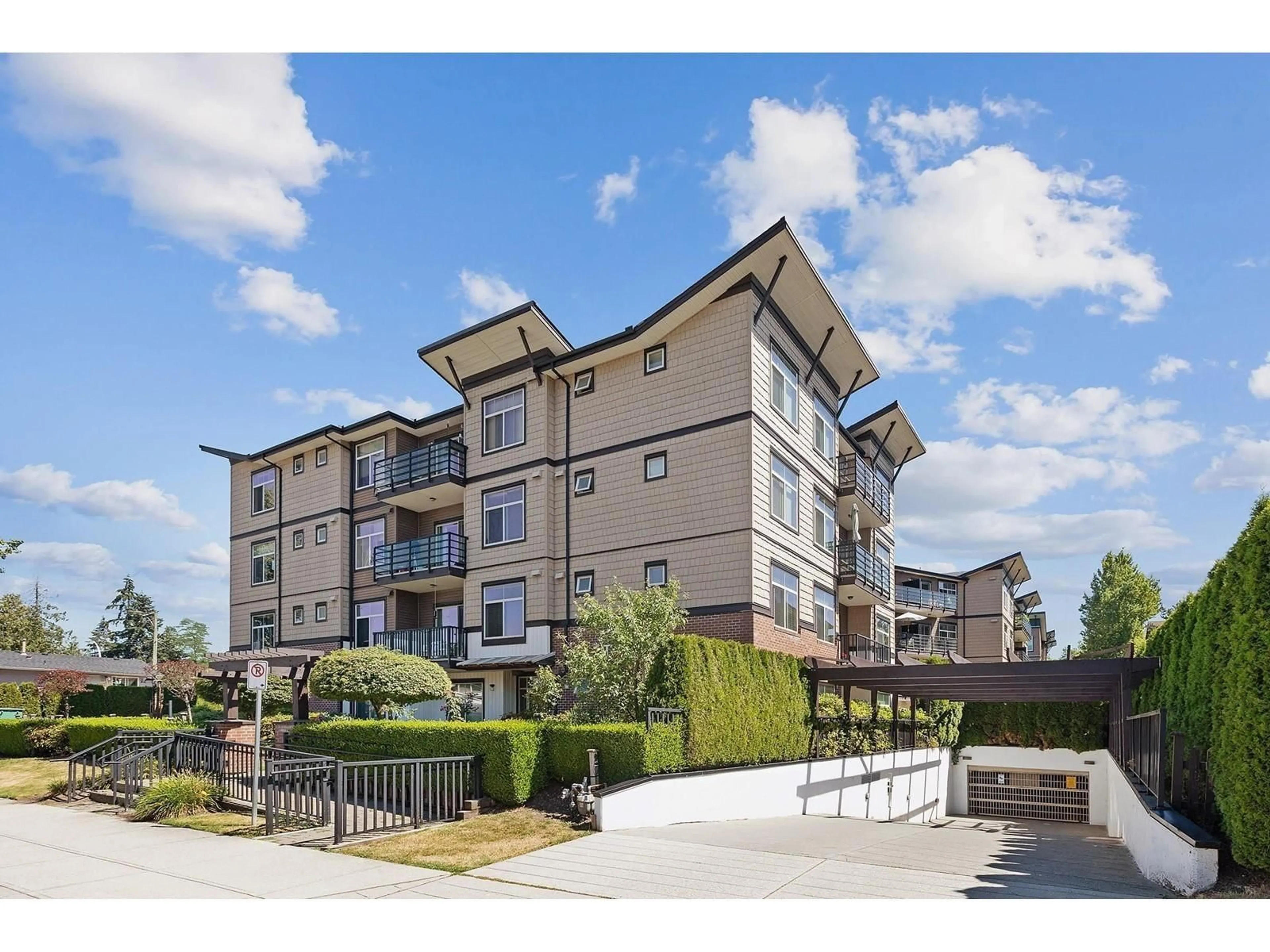 A pic from outside/outdoor area/front of a property/back of a property/a pic from drone, unknown for 411 - 8168 120A, Surrey British Columbia V3W3P3