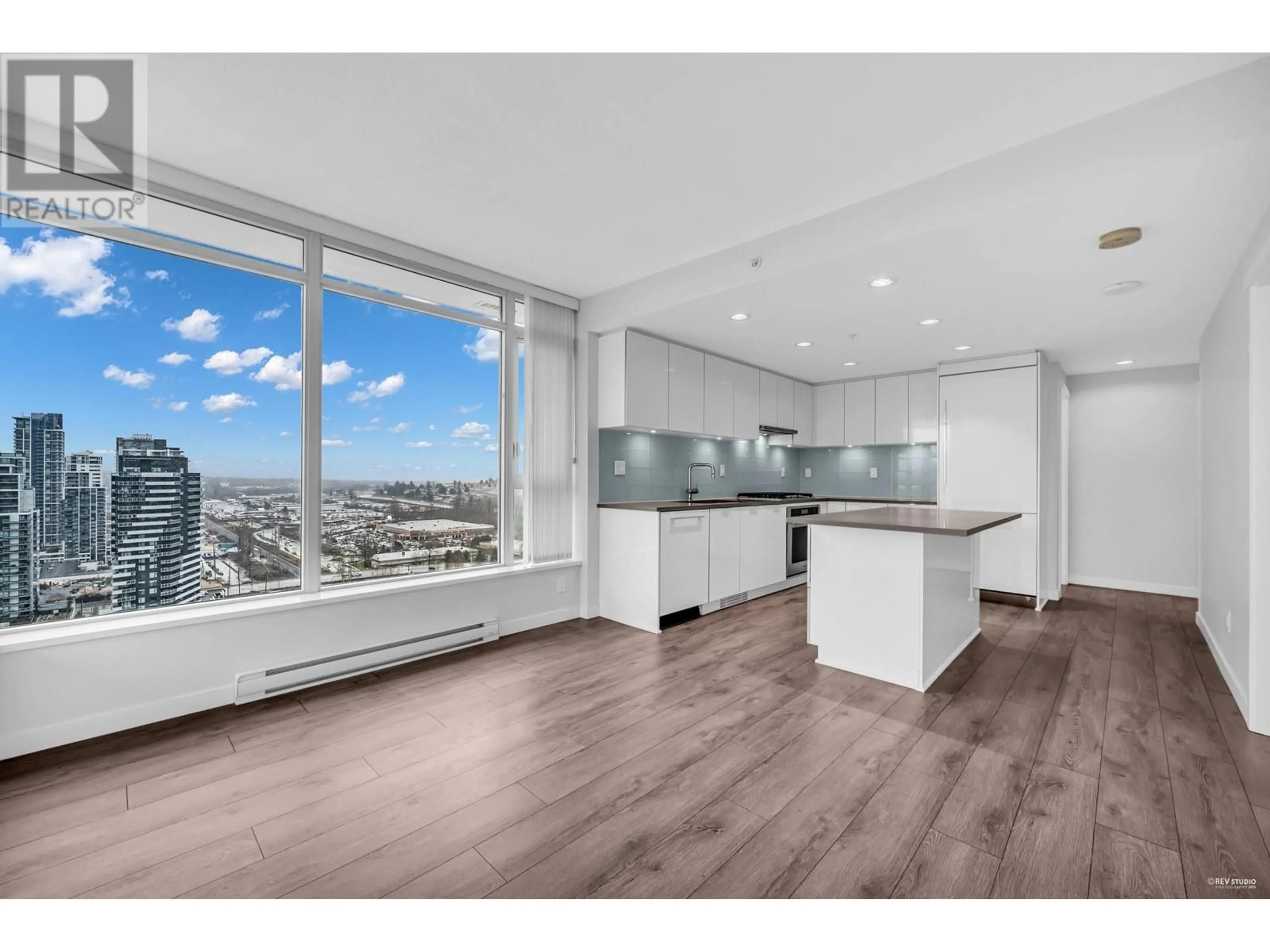 Open concept kitchen, wood/laminate floor for 2508 - 2388 MADISON AVENUE, Burnaby British Columbia V5C0K8