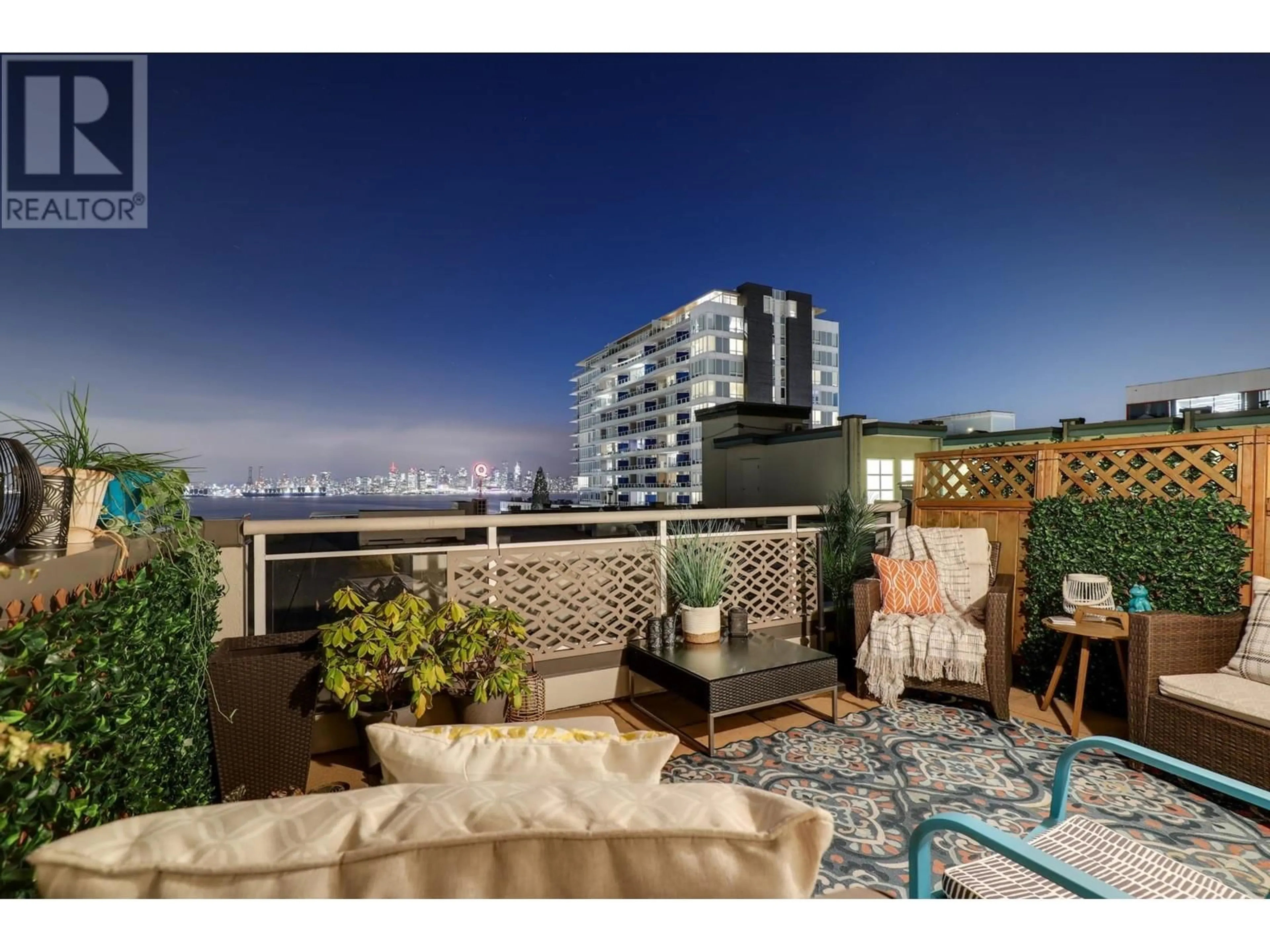 Patio, city buildings view from balcony for 406 - 108 ESPLANADE, North Vancouver British Columbia V7M3M8