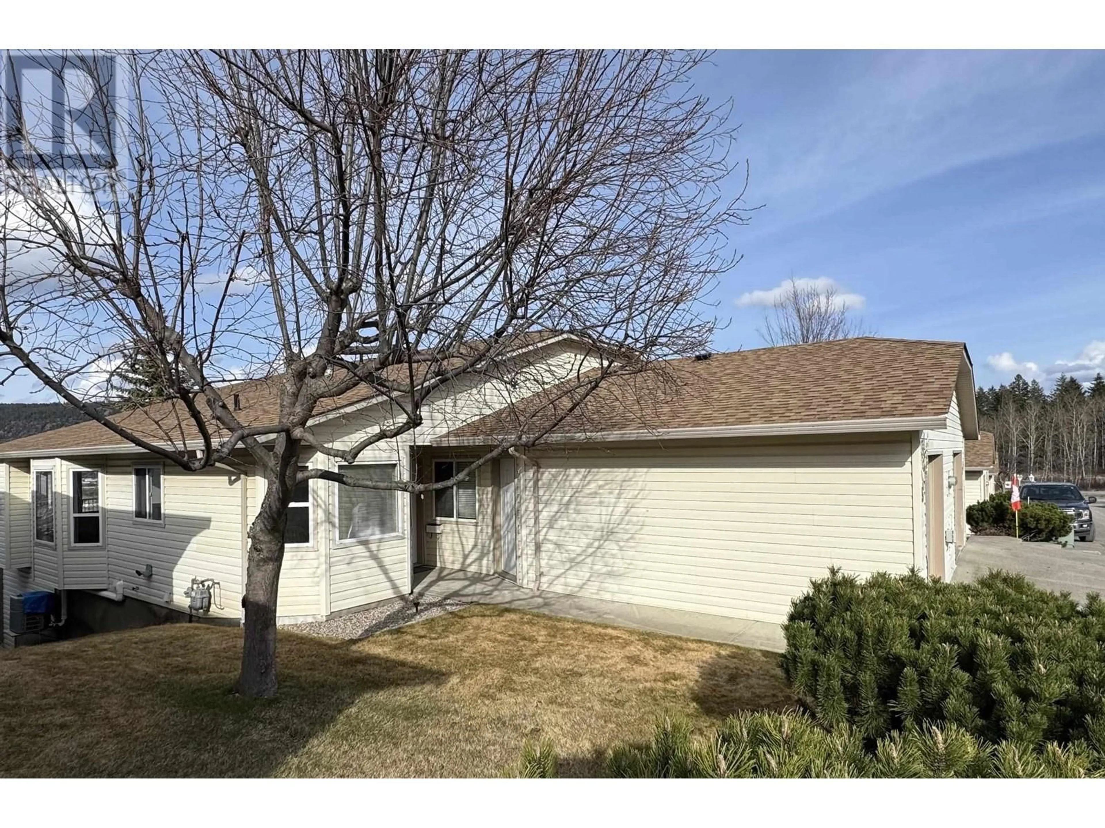 Home with vinyl exterior material, street for 52 - 500 WOTZKE DRIVE, Williams Lake British Columbia V2G4S9