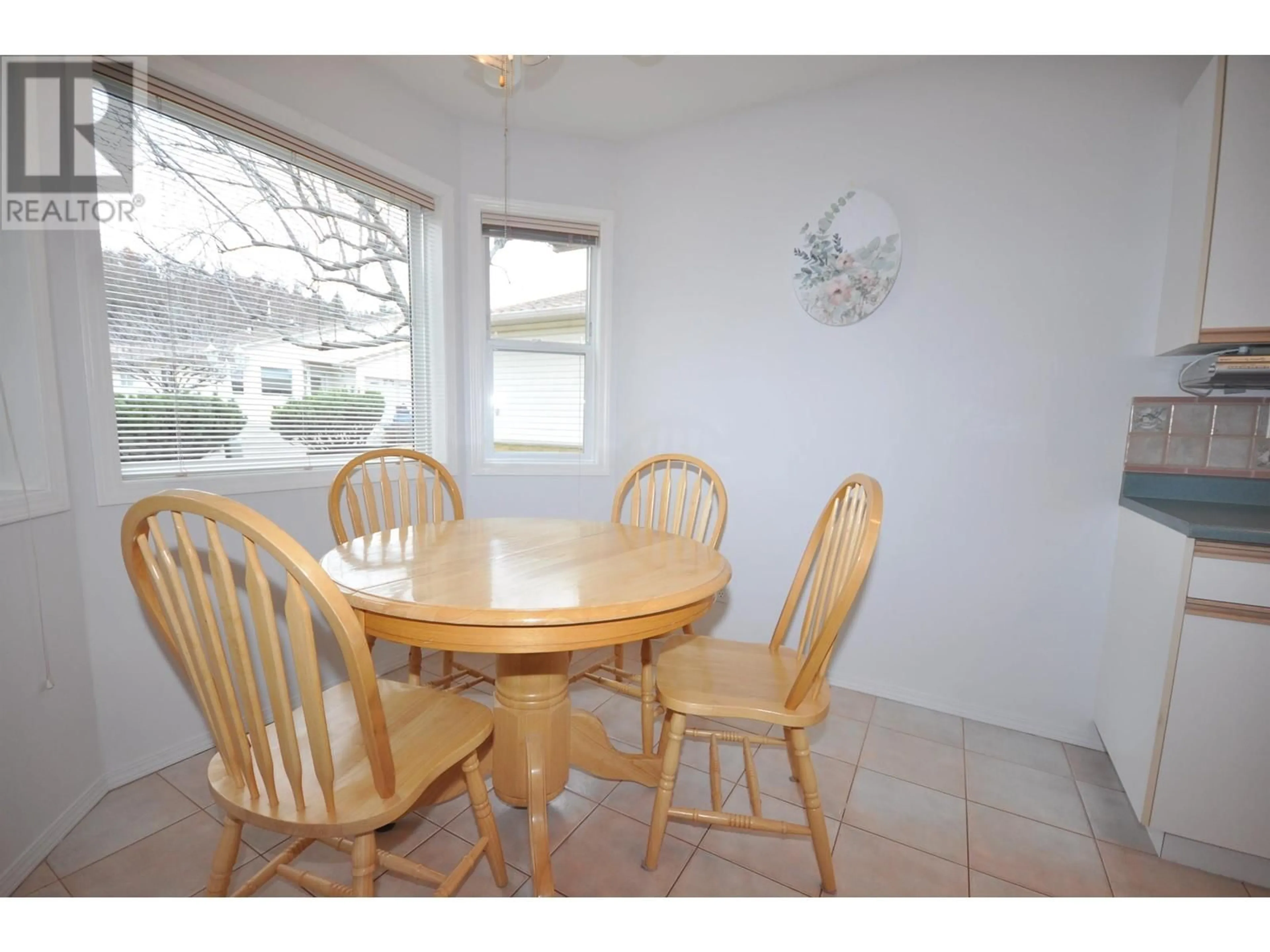 Dining room, wood/laminate floor for 52 - 500 WOTZKE DRIVE, Williams Lake British Columbia V2G4S9