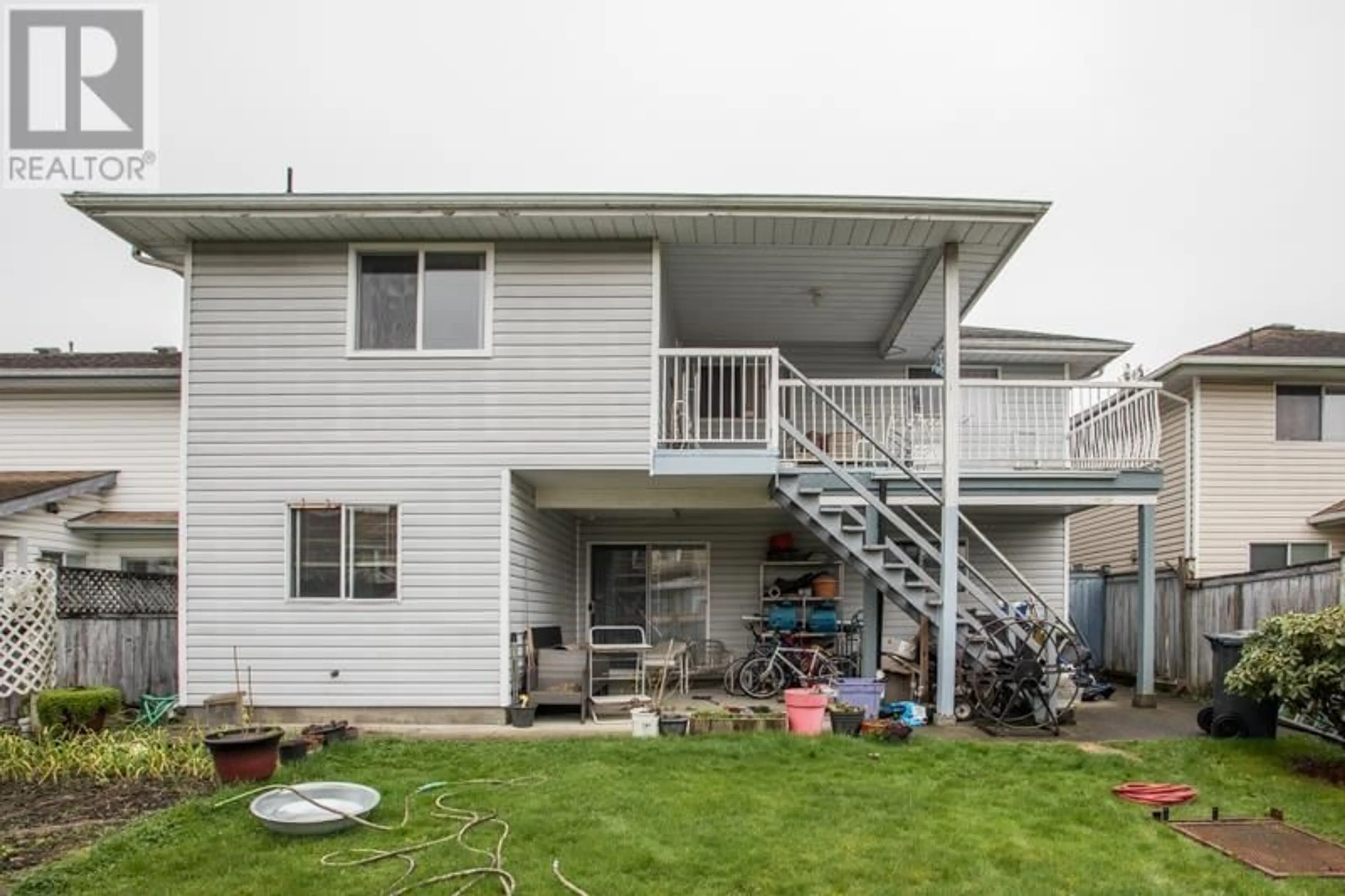 Home with vinyl exterior material, mountain view for 7451 NO. 2 ROAD, Richmond British Columbia V7C3L7