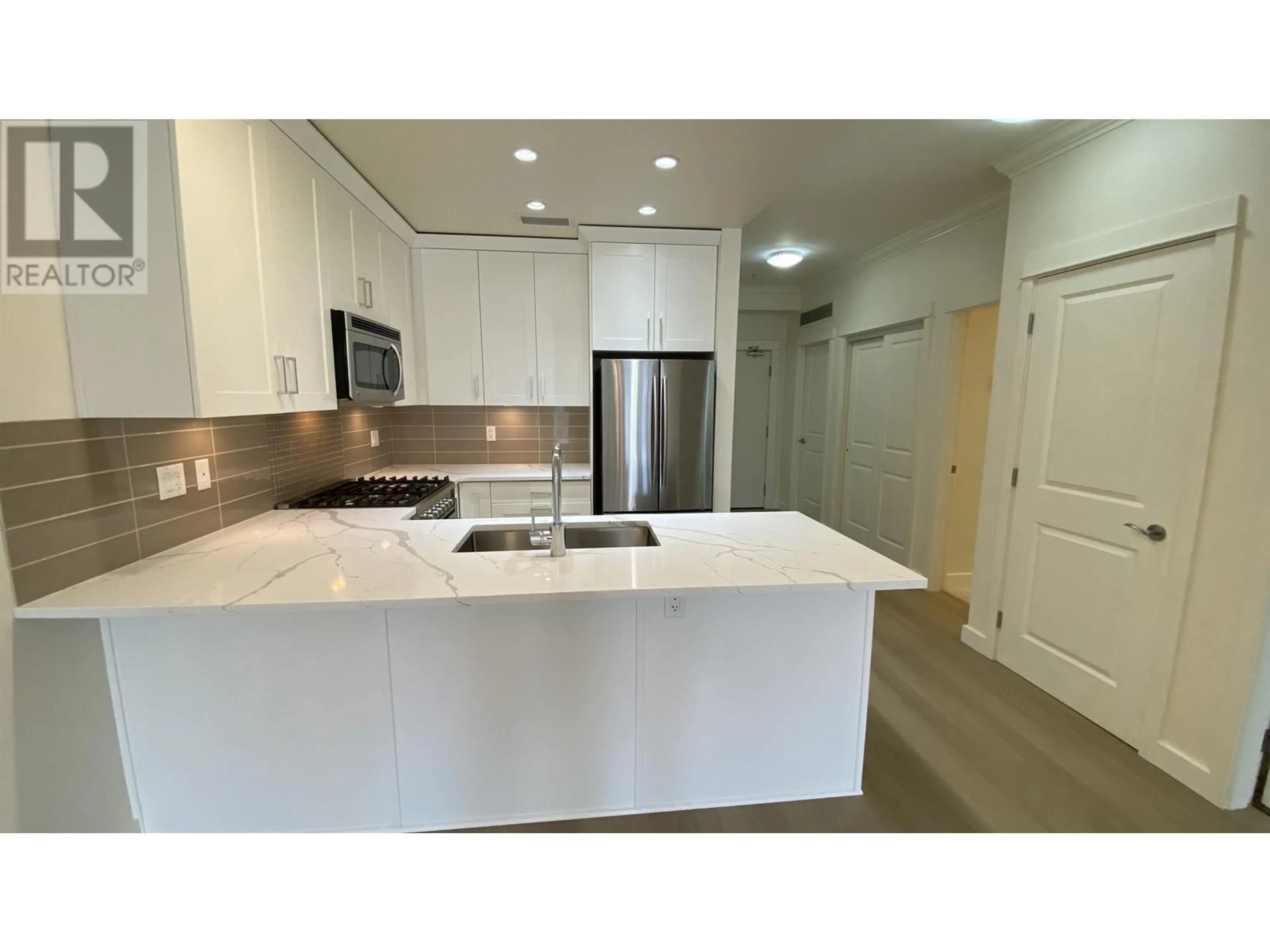 Open concept kitchen, unknown for 101 - 5099 SPRINGS BOULEVARD, Delta British Columbia V4M0A2