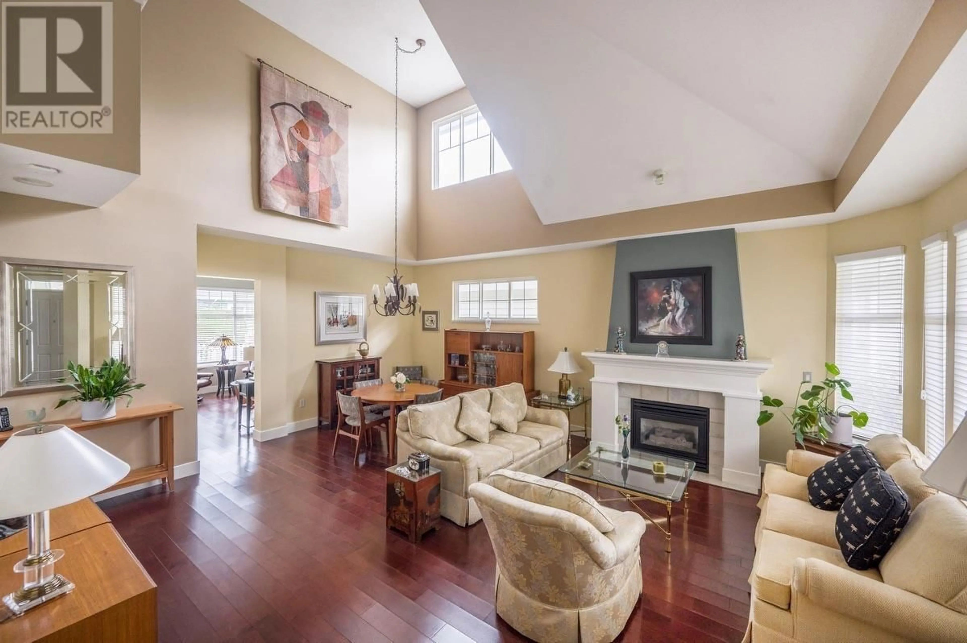 Living room with furniture, wood/laminate floor for 14 - 5900 FERRY ROAD, Delta British Columbia V4K5C3