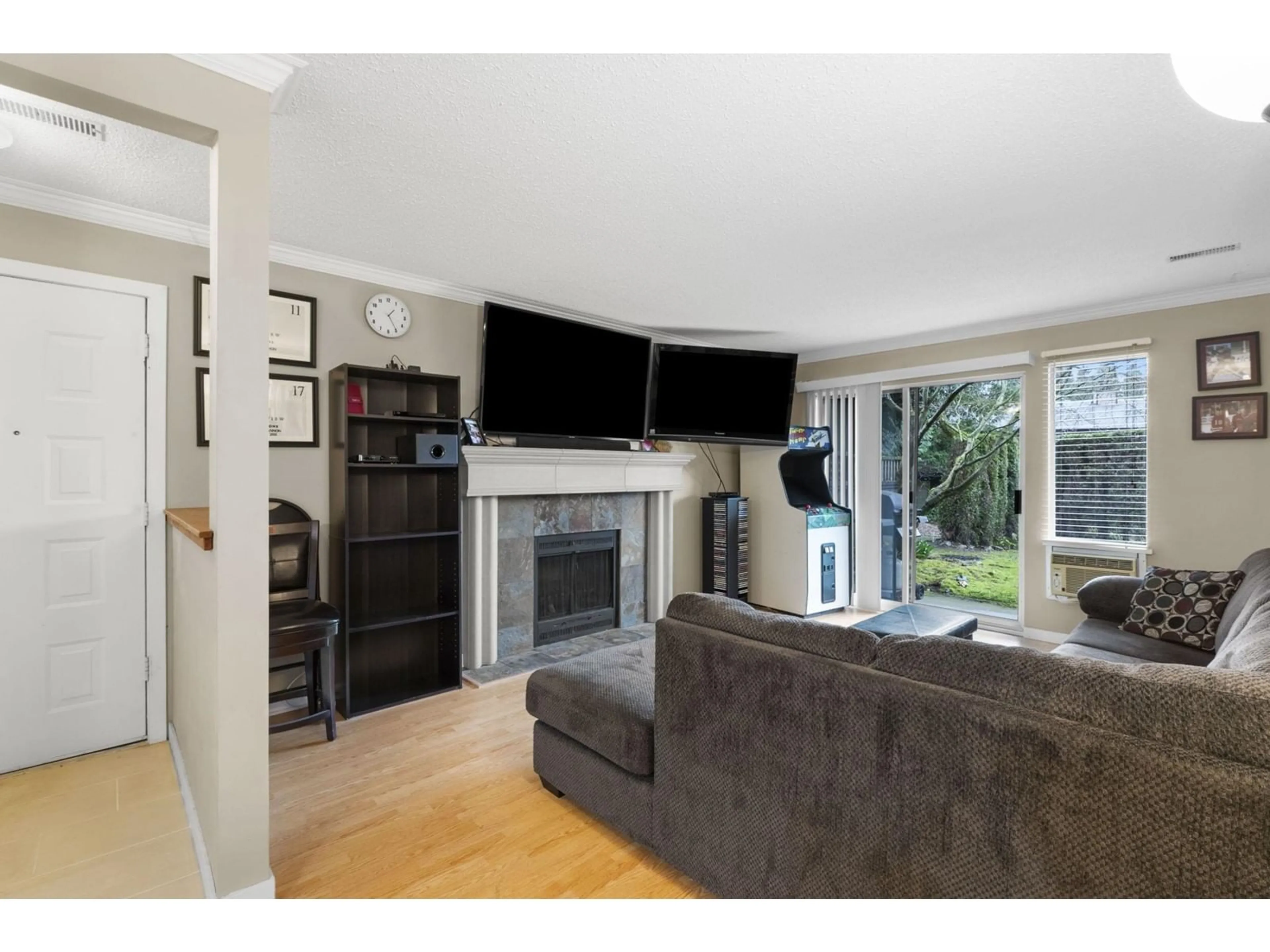 Living room with furniture, wood/laminate floor for 1114 - 34909 OLD YALE, Abbotsford British Columbia V3G2E7