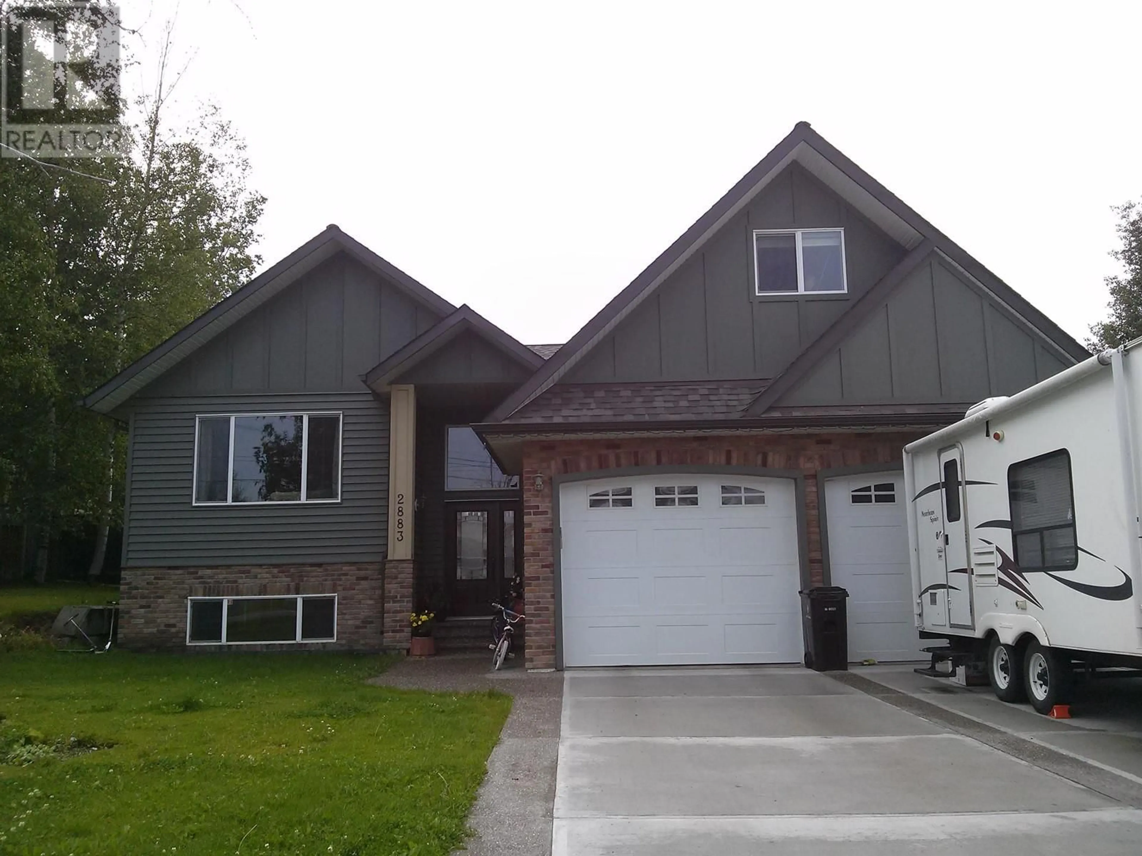 Home with vinyl exterior material, street for 2883 PARENT ROAD, Prince George British Columbia V2N5G2