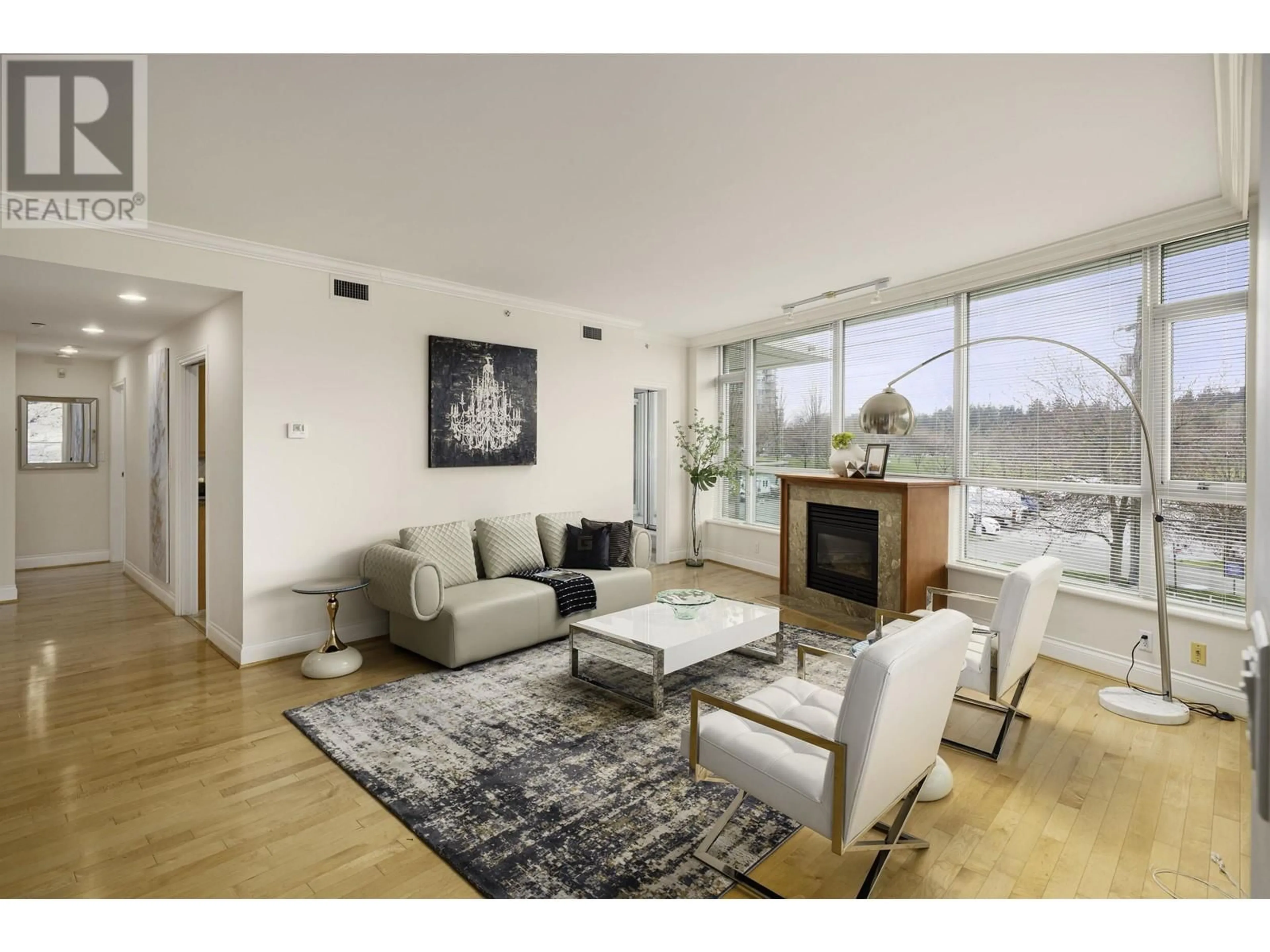 Living room with furniture, wood/laminate floor for 202 - 1777 BAYSHORE DRIVE, Vancouver British Columbia V6G3H2