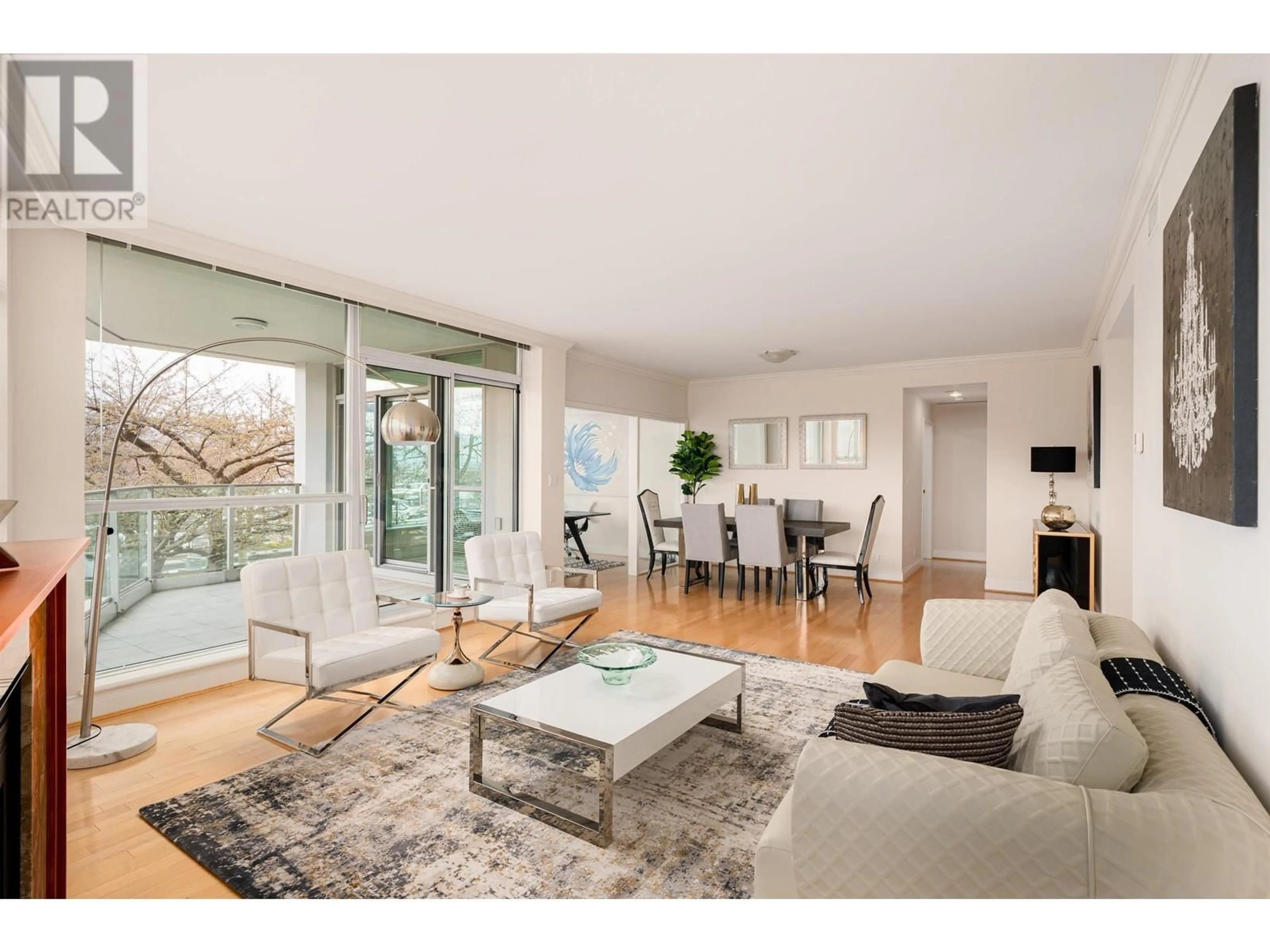 Living room with furniture, wood/laminate floor for 202 - 1777 BAYSHORE DRIVE, Vancouver British Columbia V6G3H2
