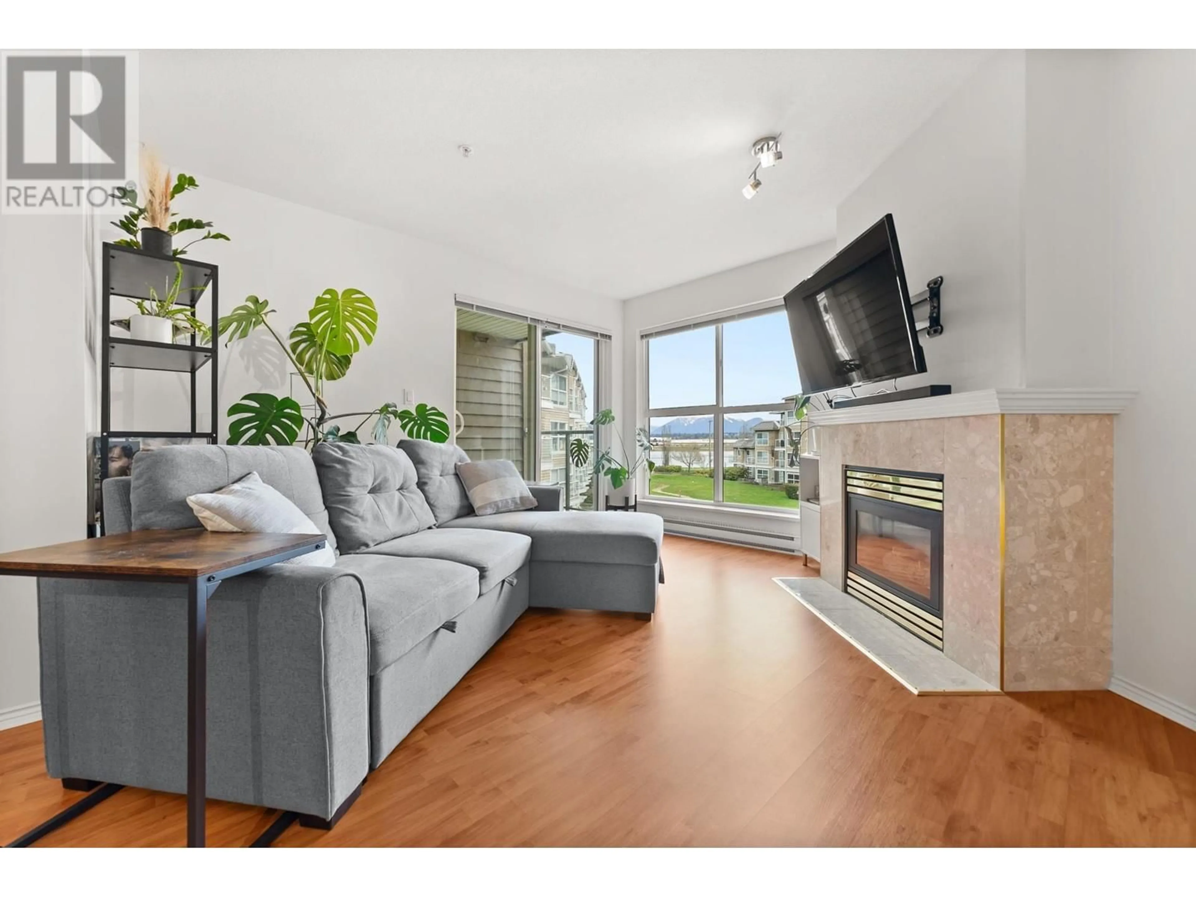 Living room with furniture, wood/laminate floor for 328 - 5880 DOVER CRESCENT, Richmond British Columbia V7C5P5