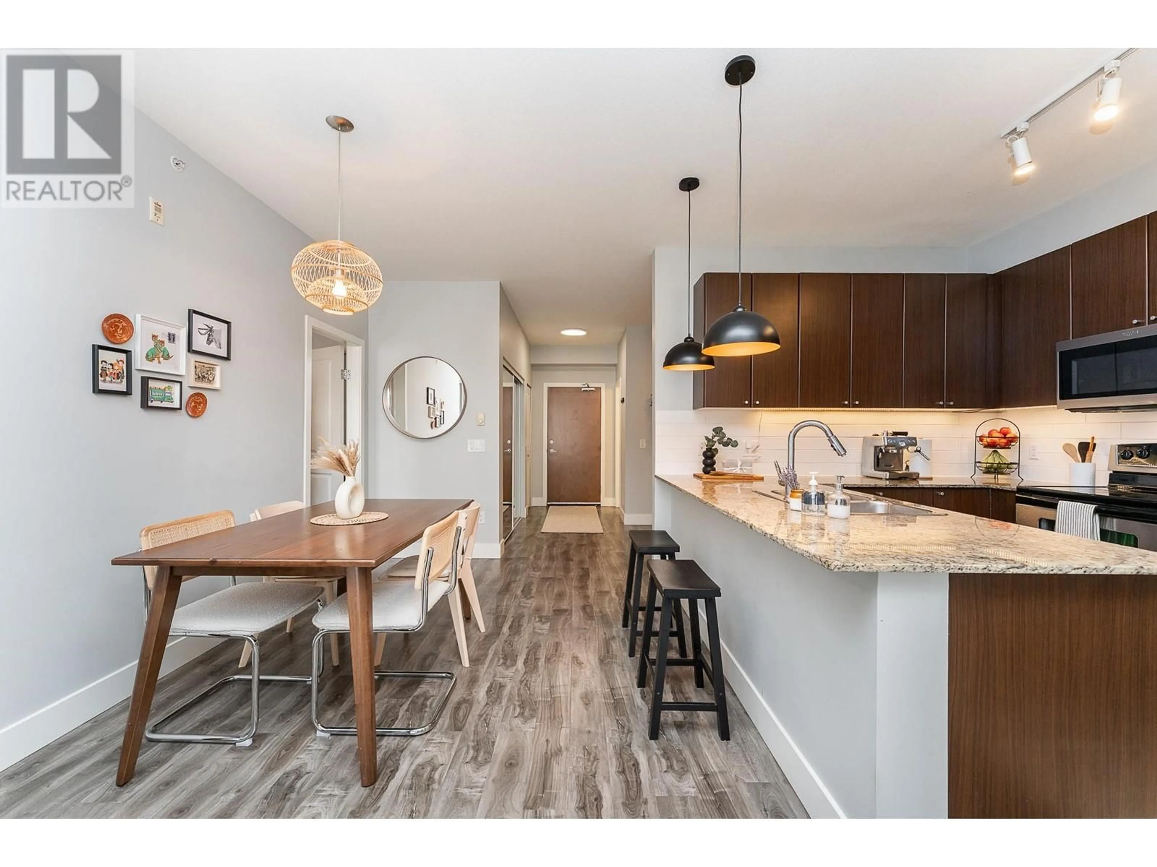 Open concept kitchen, wood/laminate floor for 407 - 2484 WILSON AVENUE, Port Coquitlam British Columbia V3C0A5