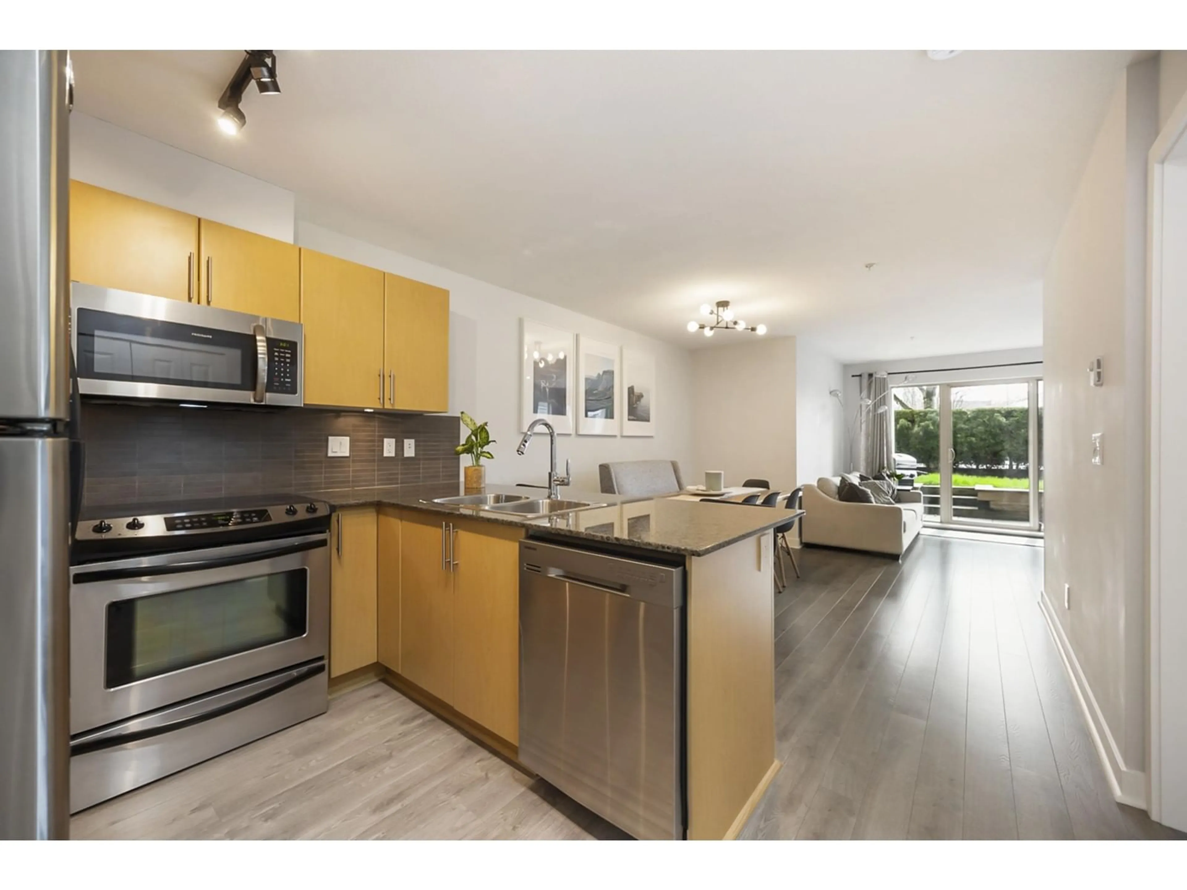 Open concept kitchen, wood/laminate floor for B108 - 8929 202, Langley British Columbia V1M0B4