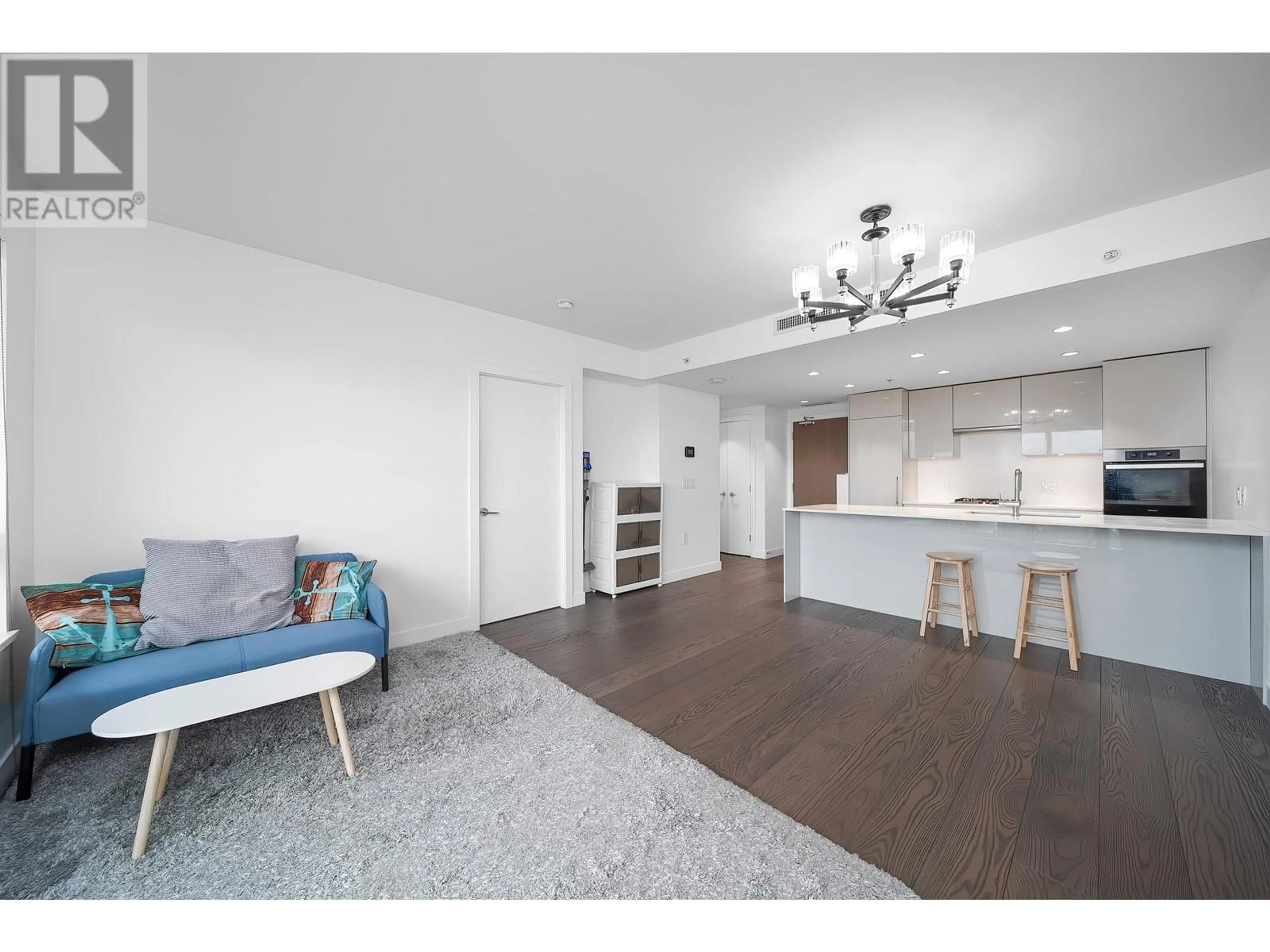 Open concept kitchen, wood/laminate floor for 1108 - 5766 GILBERT ROAD, Richmond British Columbia V7C0G2