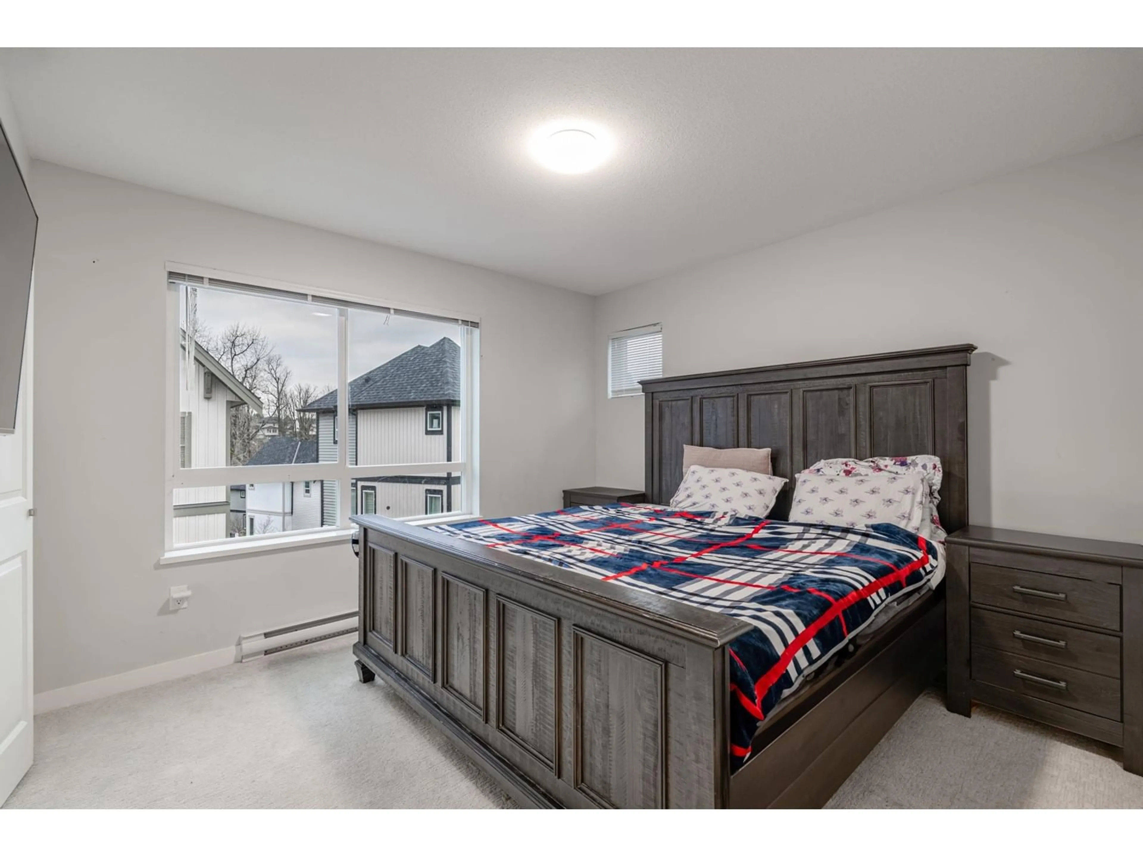 Bedroom with bed, wood/laminate floor for 155 - 30930 WESTRIDGE, Abbotsford British Columbia V2T0H6